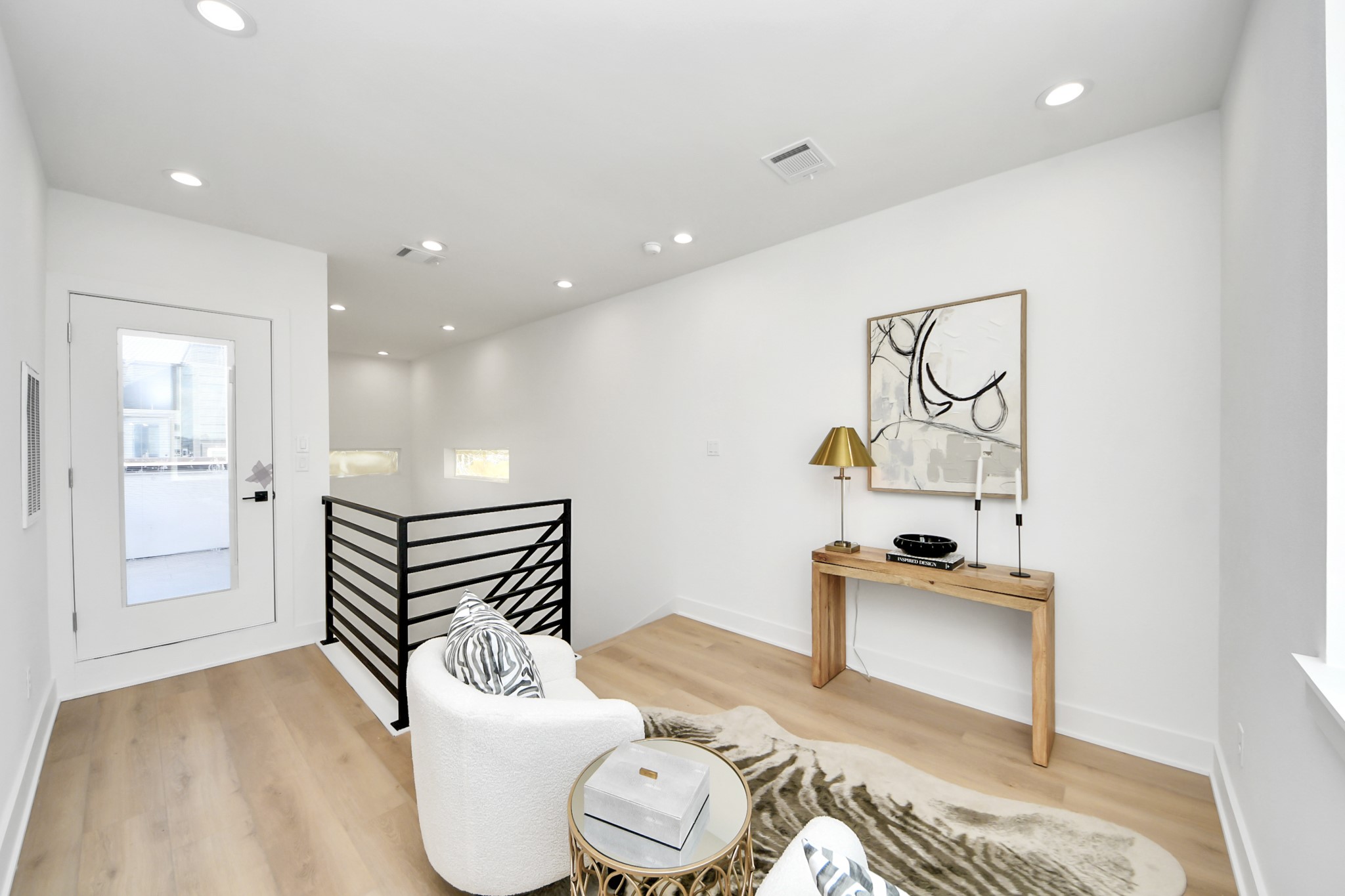 Fourth-floor flex space with direct access to the rooftop terrace.