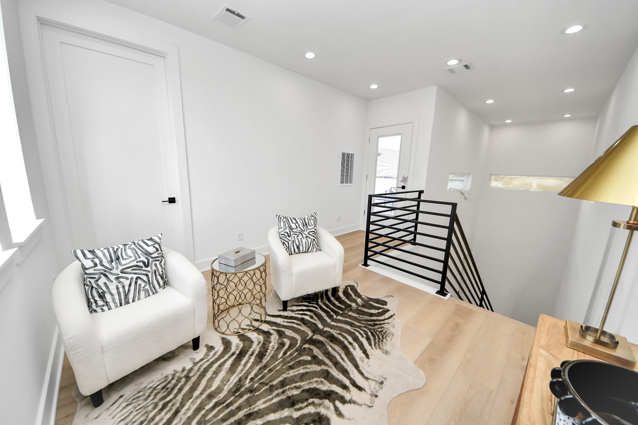 Fourth-floor sitting area filled with natural light.