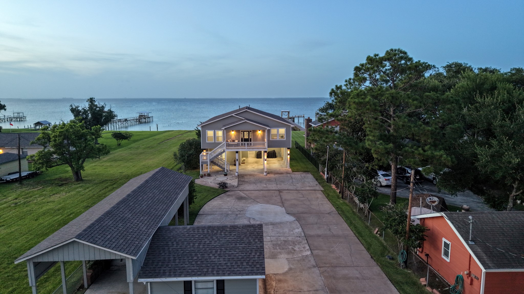 Perfect coastal positioning offering over half an acre of privacy along the water.