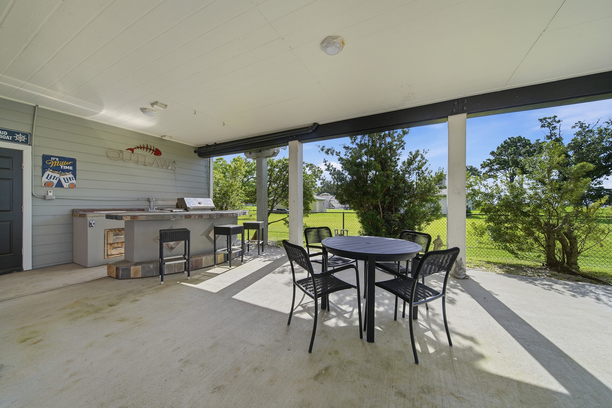 Fire up the grill and entertain effortlessly in your premium outdoor kitchen oasis.