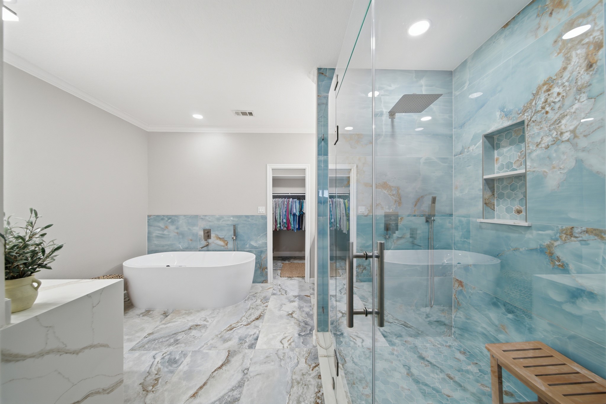 This Primary Bathroom looking like a resort-style spa.