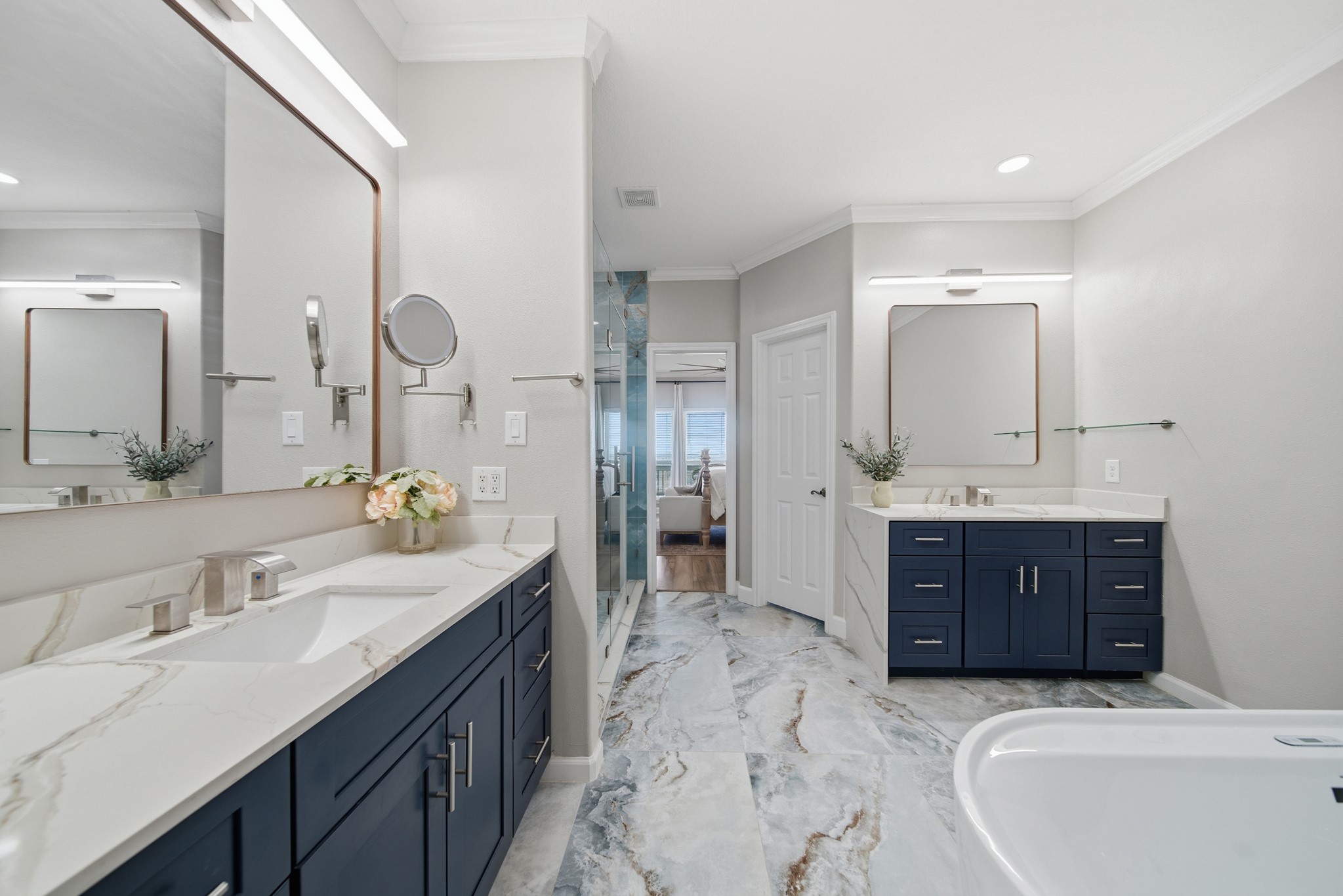 Enjoy the luxury of expansive double vanities and sleek quartz finishes.