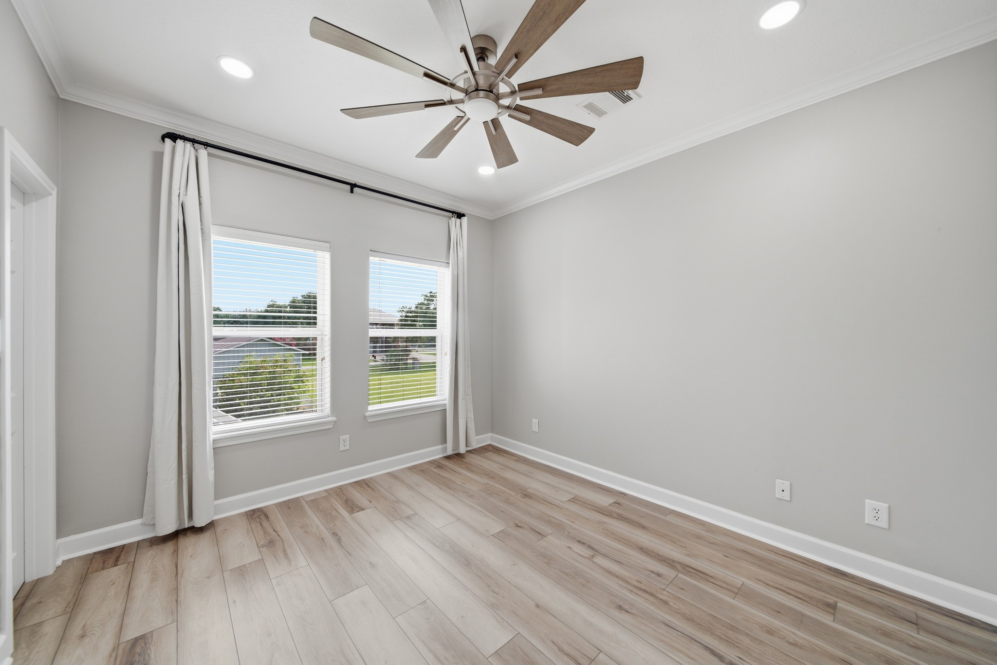 Design your ideal space in this versatile, freshly painted room.