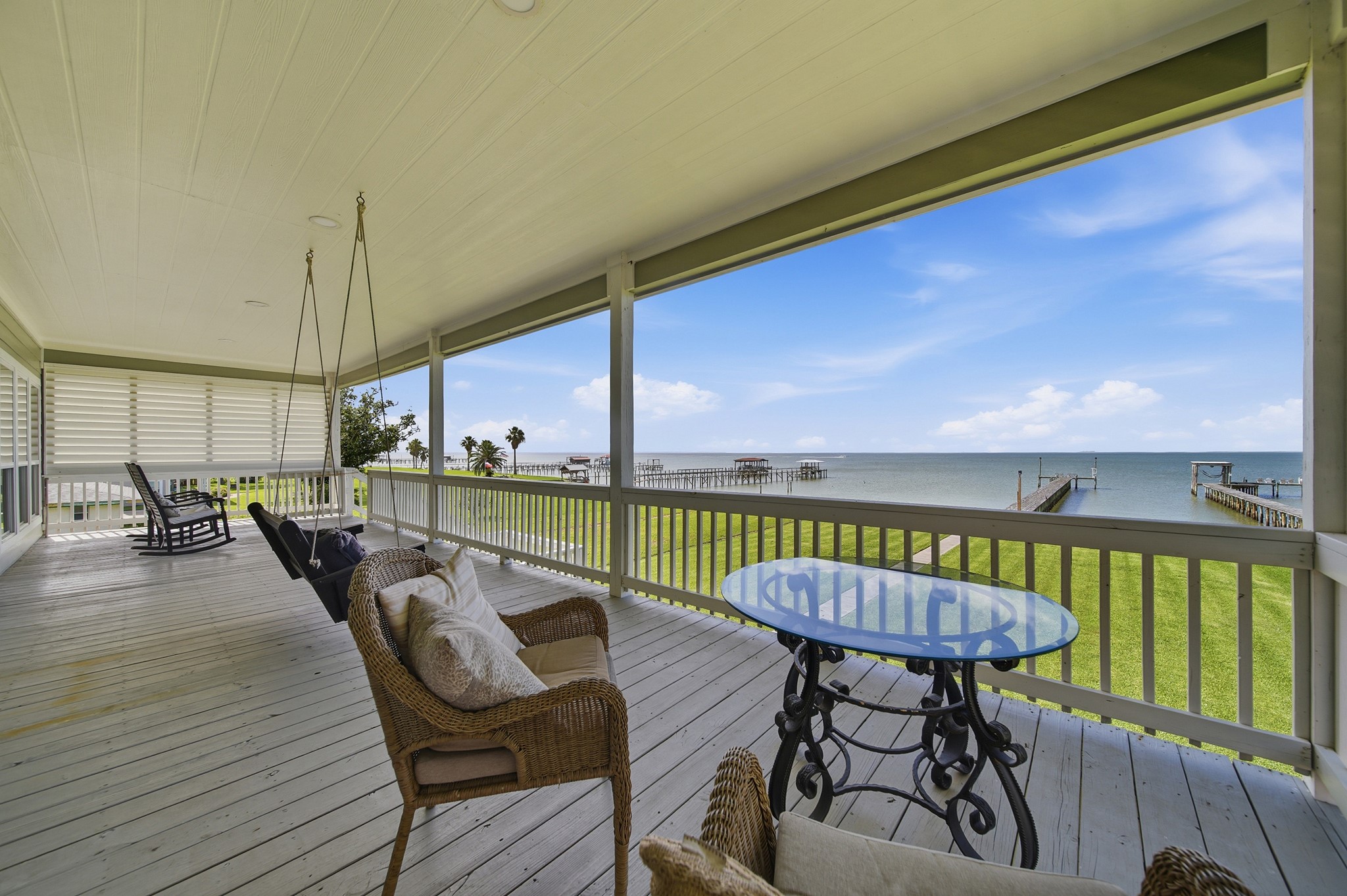 Sip your morning coffee from the sweeping upper deck overlooking the bay.