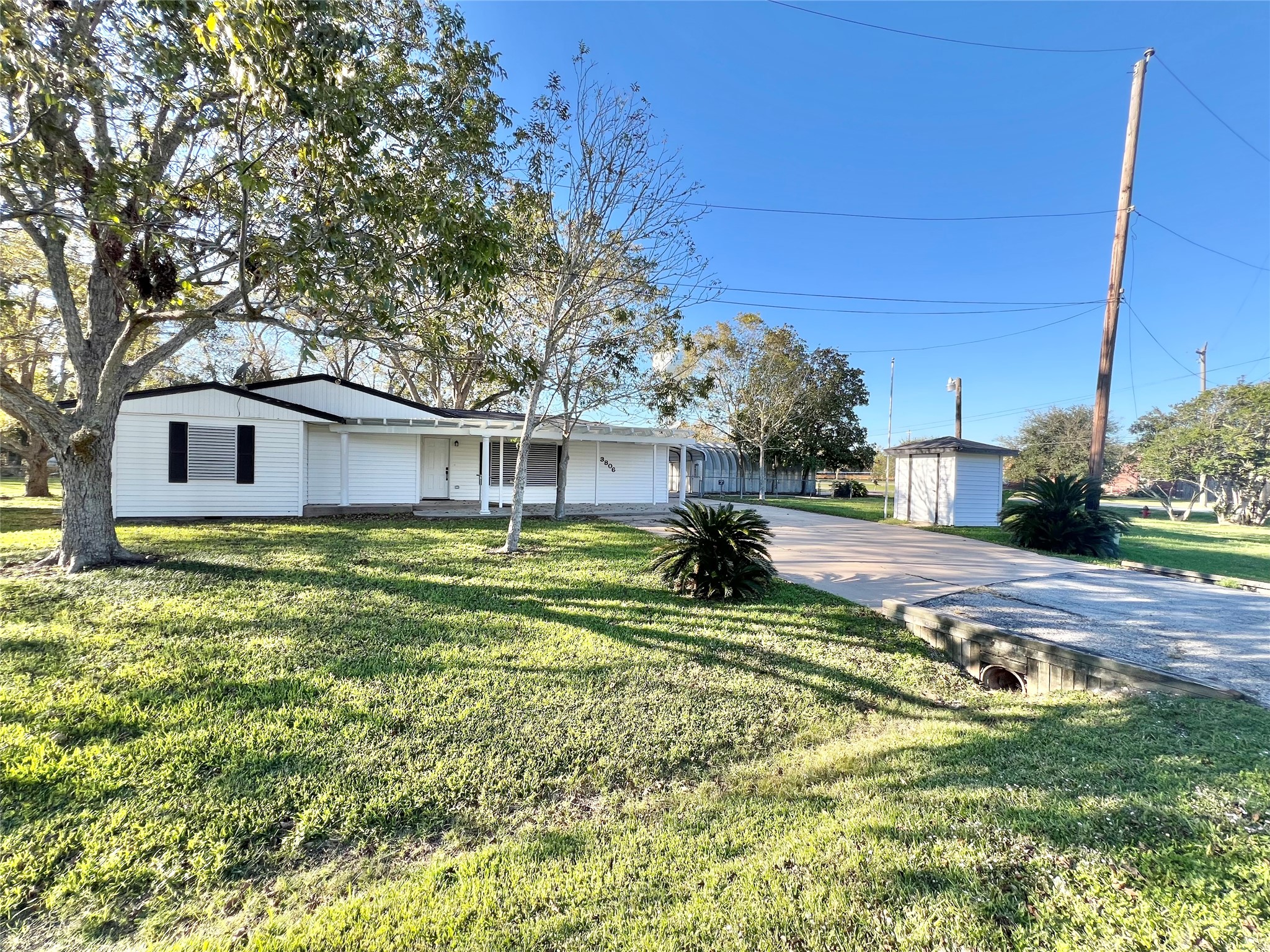 This impeccably remodeled home is just part of what is offered on this almost half acre lot!