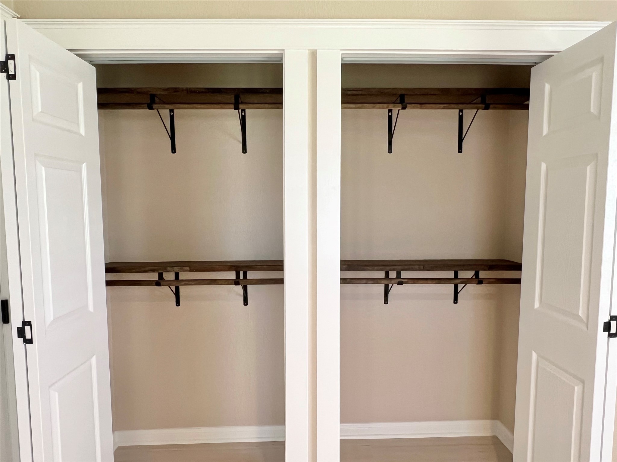 Double Decking for hanging clothes and fully shelved as well for extra storage.