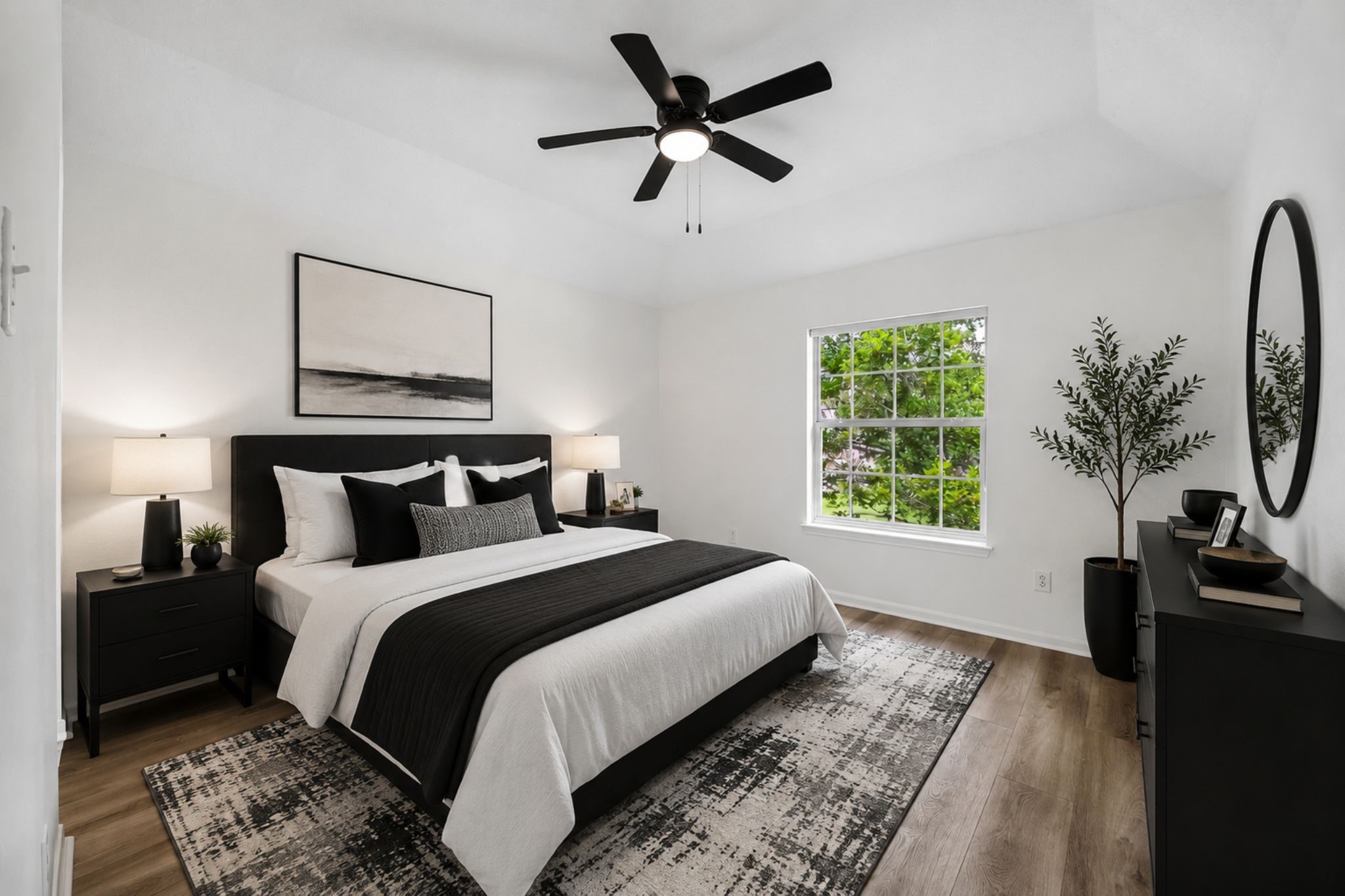 Bedroom 3 offers vaulted ceilings and natural light.**Virtually Stage.