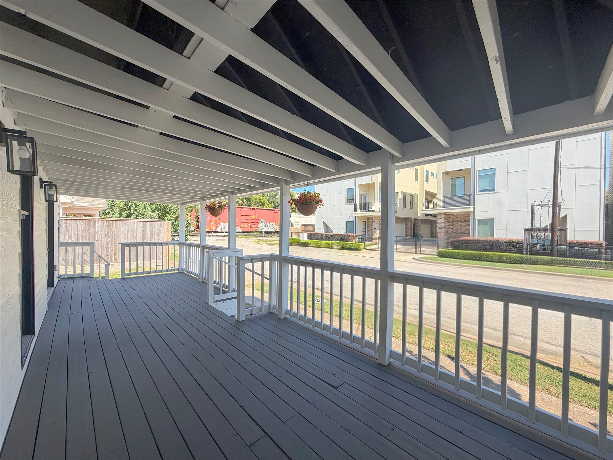 An inviting setting for outdoor seating, morning coffee, or relaxing evenings while enjoying the neighborhood surroundings.