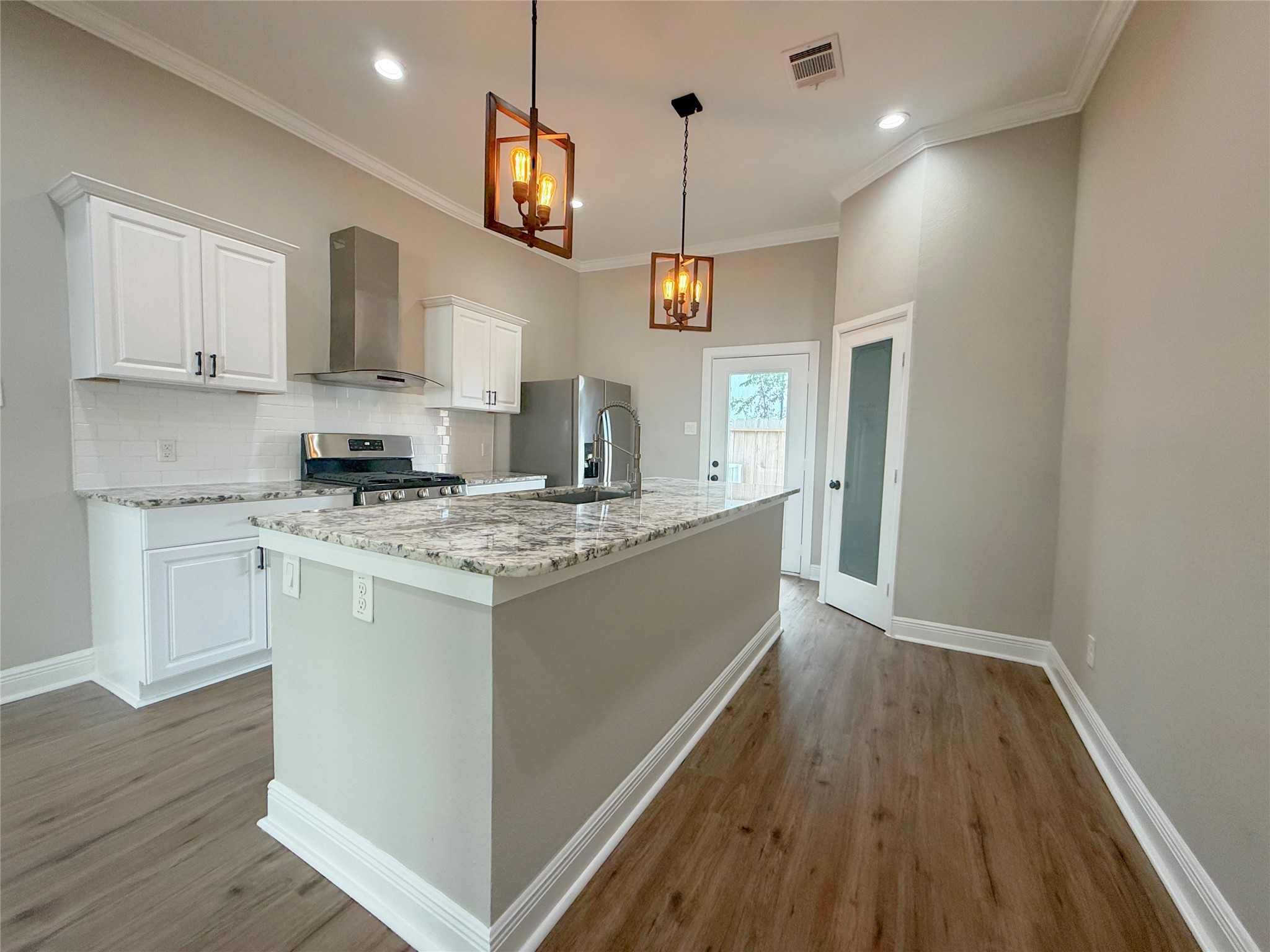 Thoughtfully designed kitchen layout combines functionality and style, with ample counter space, modern finishes, and an open arrangement ideal for everyday living.