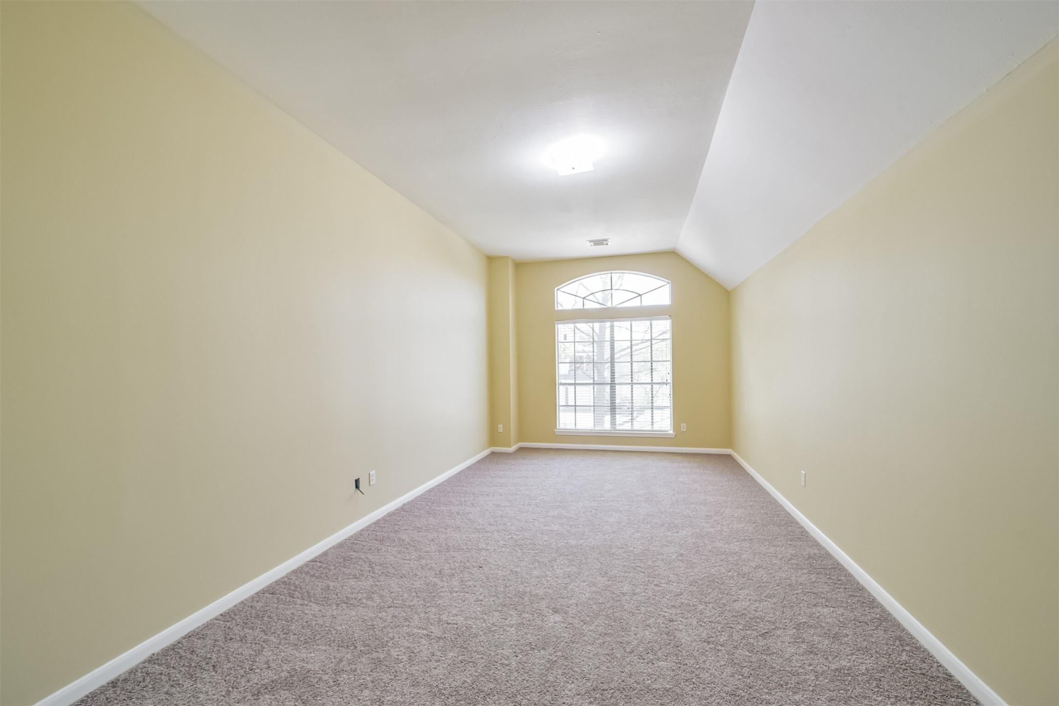 Large upstairs bonus room, open to the den, suited for a game room, media area, or play space.