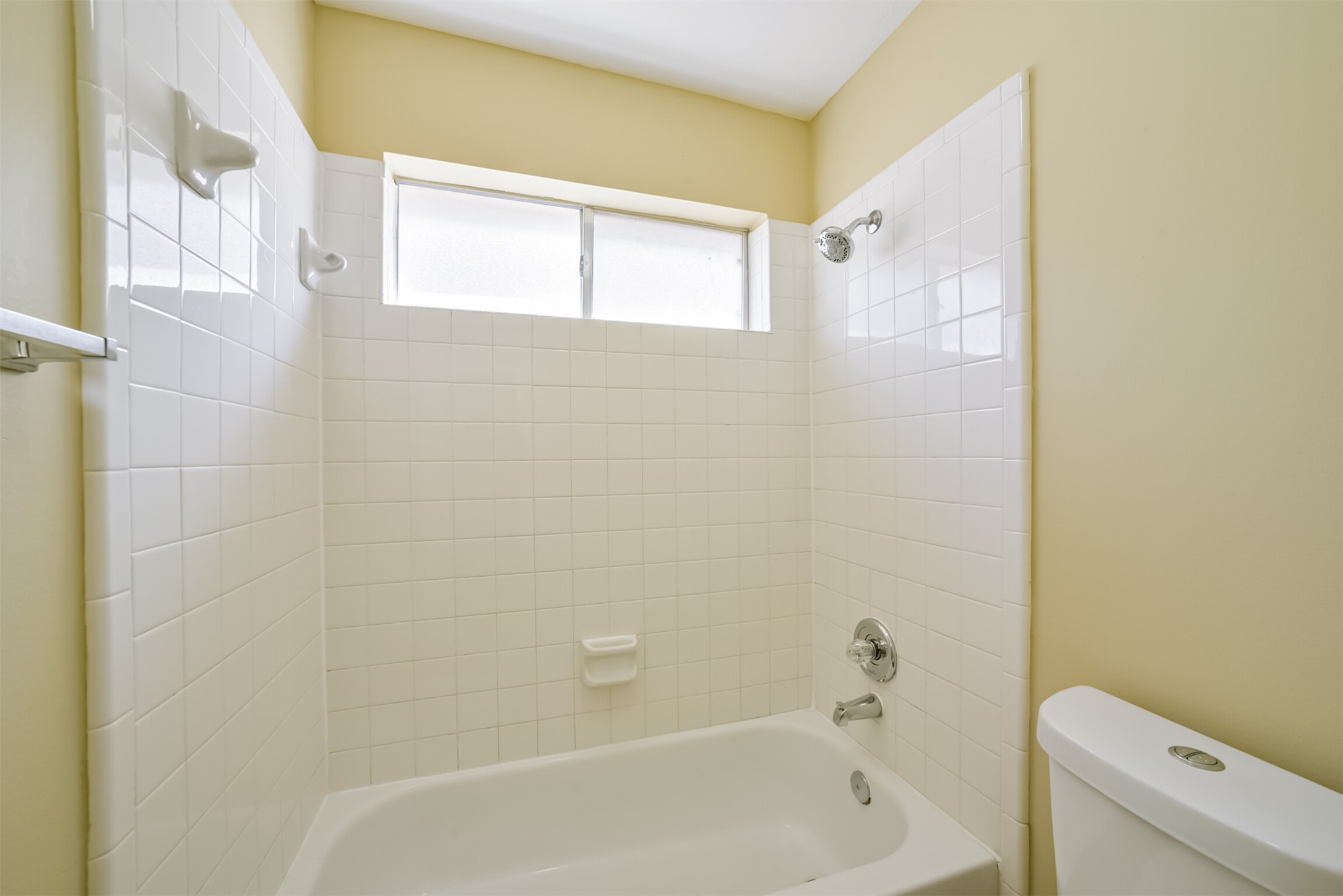 Private tub/shower room, separate from the vanity area, so two people can get ready at the same time.
