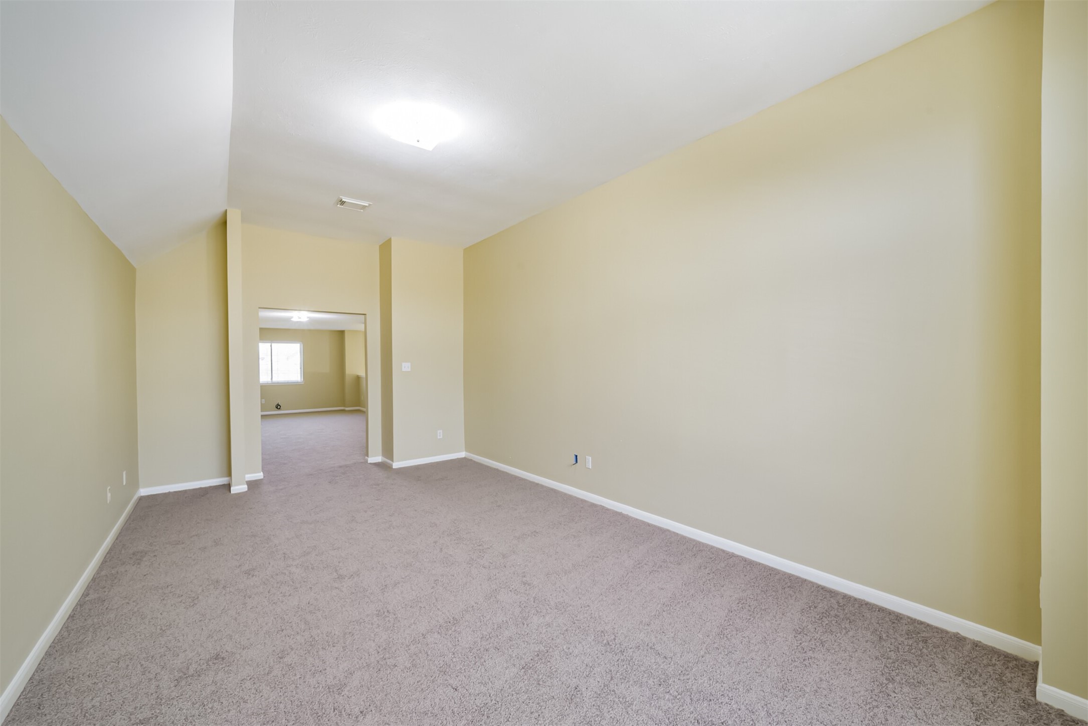 Upstairs bonus room, open to the den for easy flow between the two spaces.