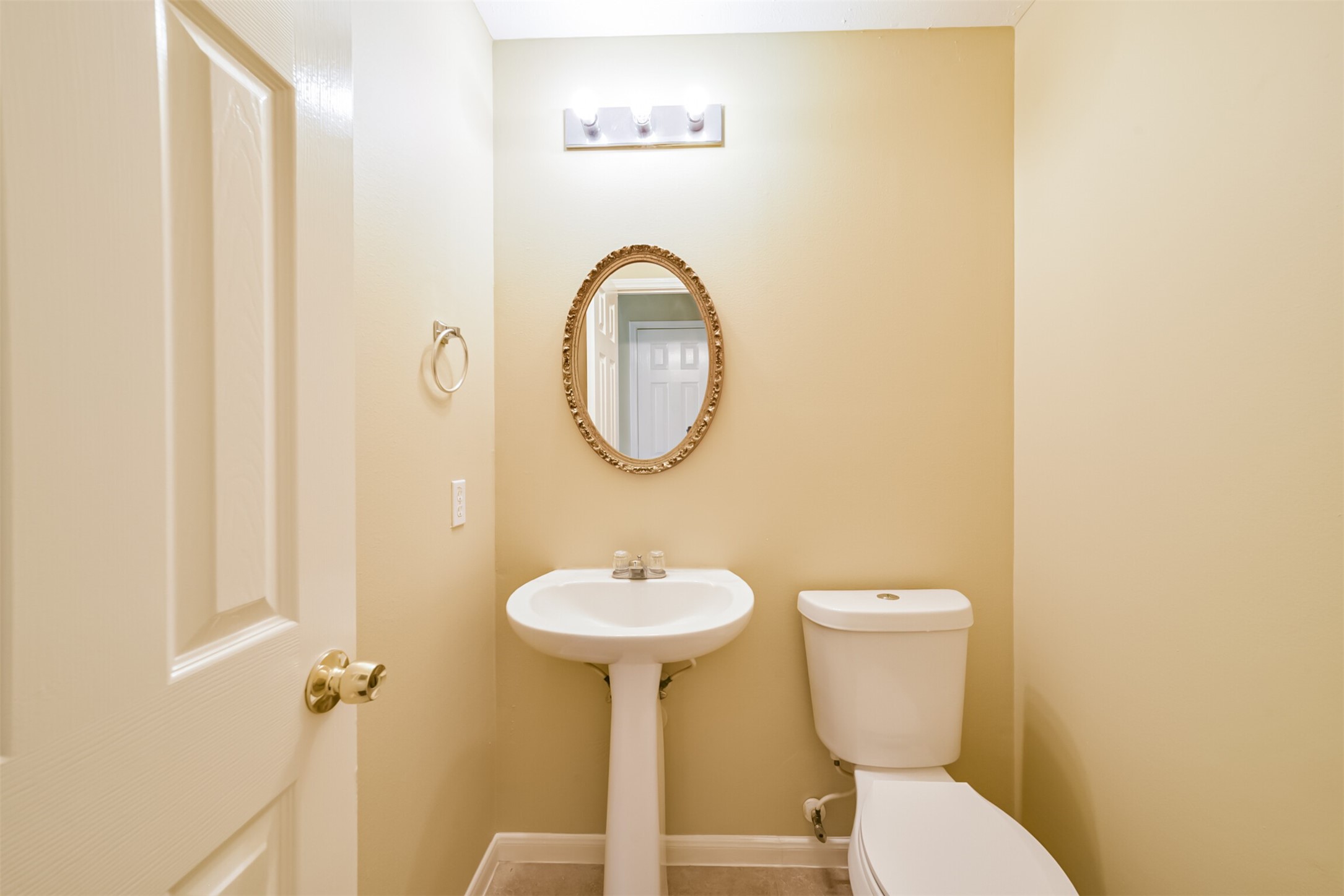 Half bath conveniently located on the main level.