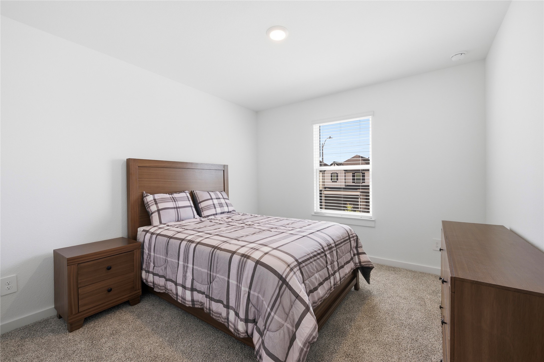 2nd bedroom is also spacious with great natural lighting.