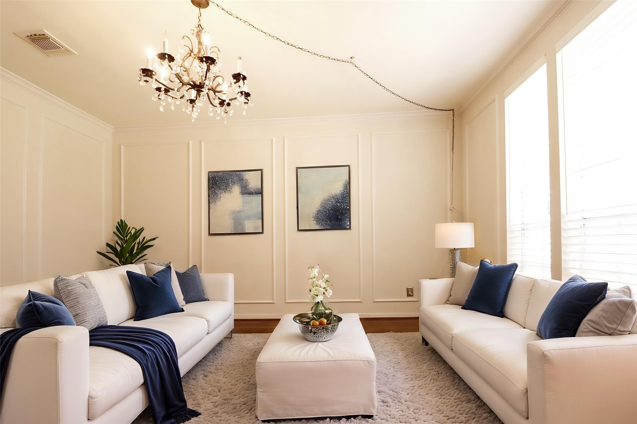 The living room at entry with virtual staging