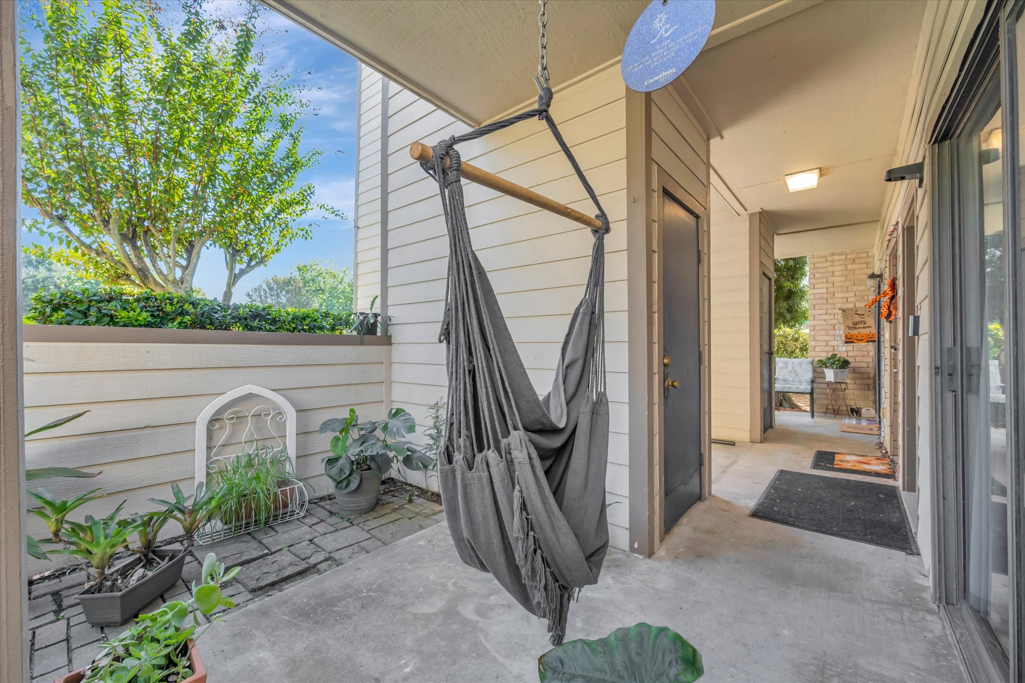 Covered patio offers an outdoor spot for relaxing just off the living area.
