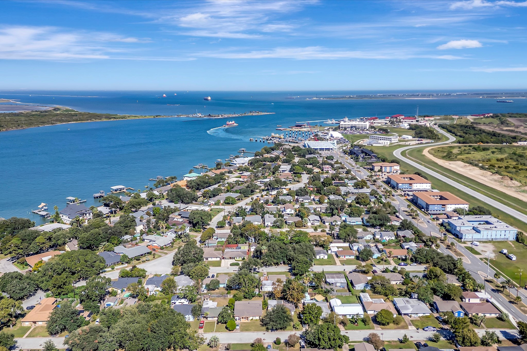 Another aerial view highlighting the islands surrounding water and coastal setting.