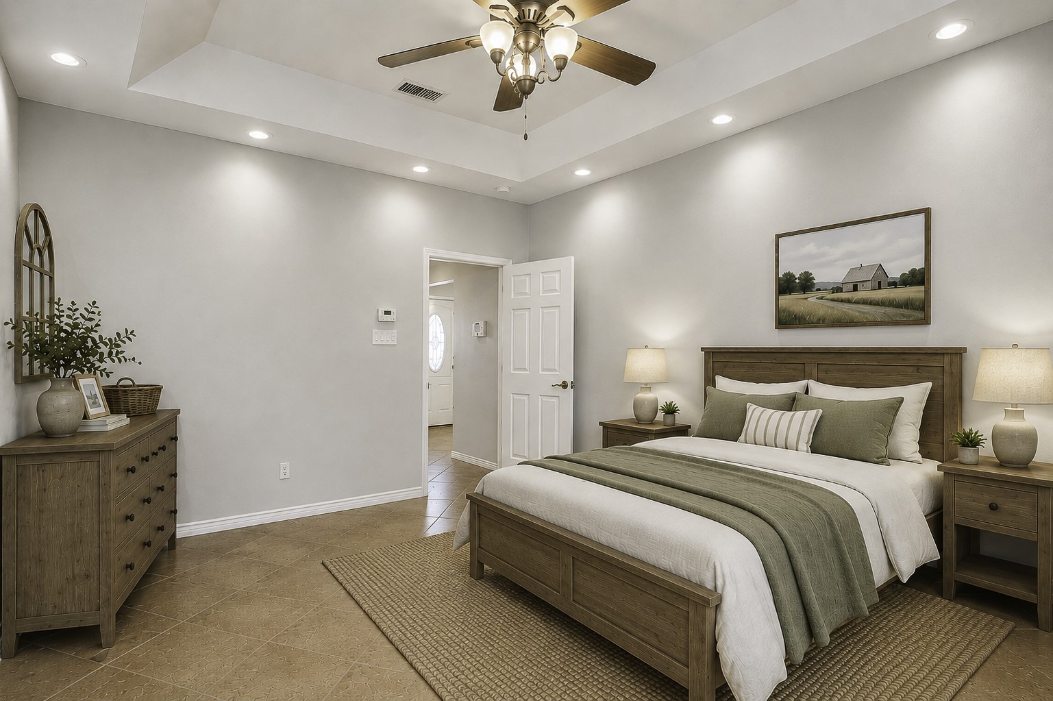 The primary bedroom is spacious and features tile floors, tray ceiling with canned lighting and ceiling fan. **Virtually Staged**