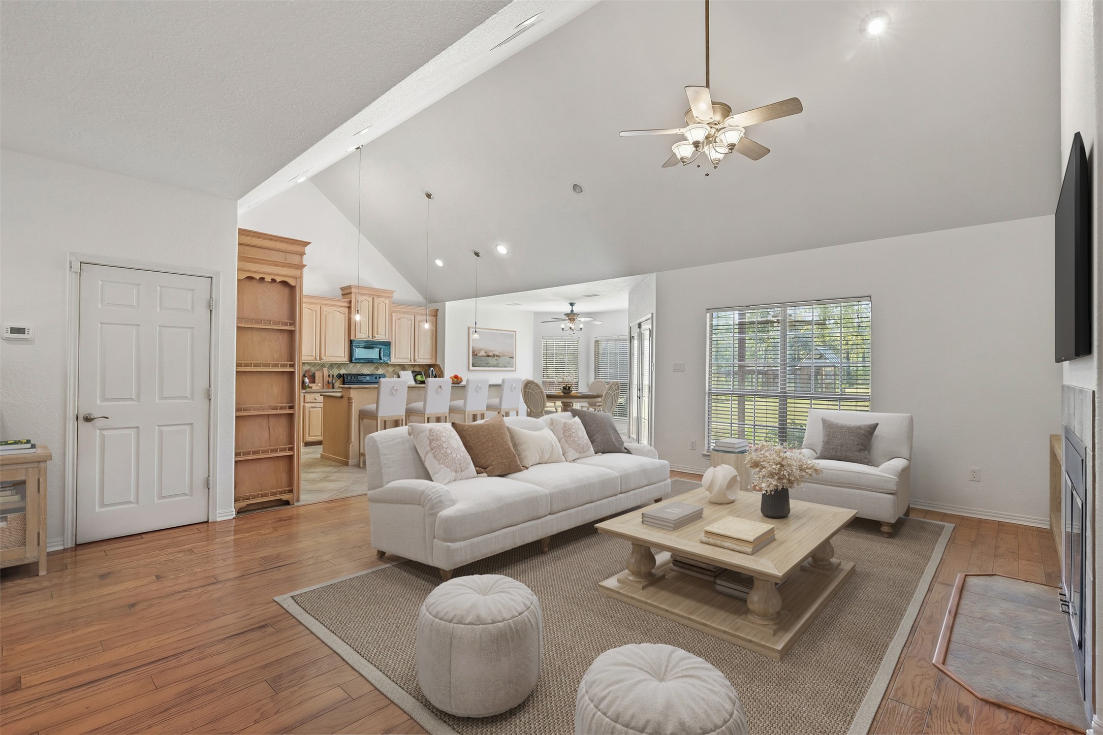 View from the front entry showcasing the open concept floorplan. **Virtually Staged**