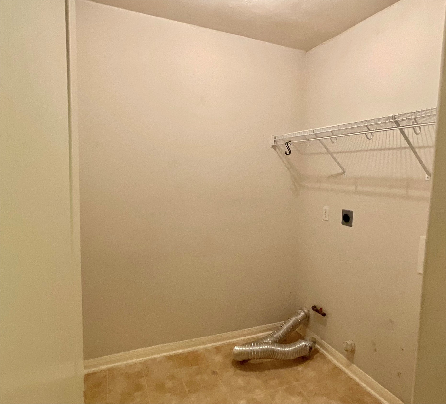 Utility/Laundry Room nestled in front bedrooms hallway