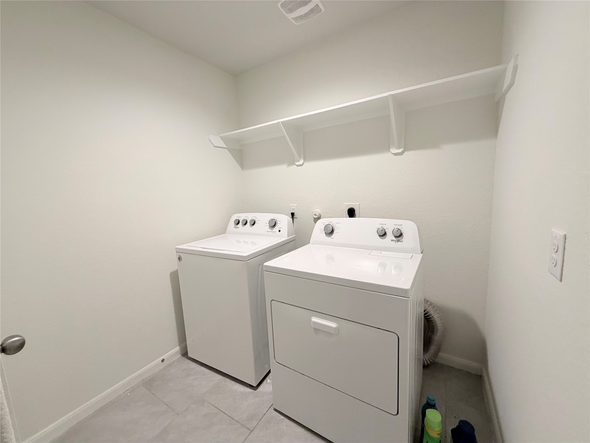 Utility room is located next to the garage. Washer and dryer are included!