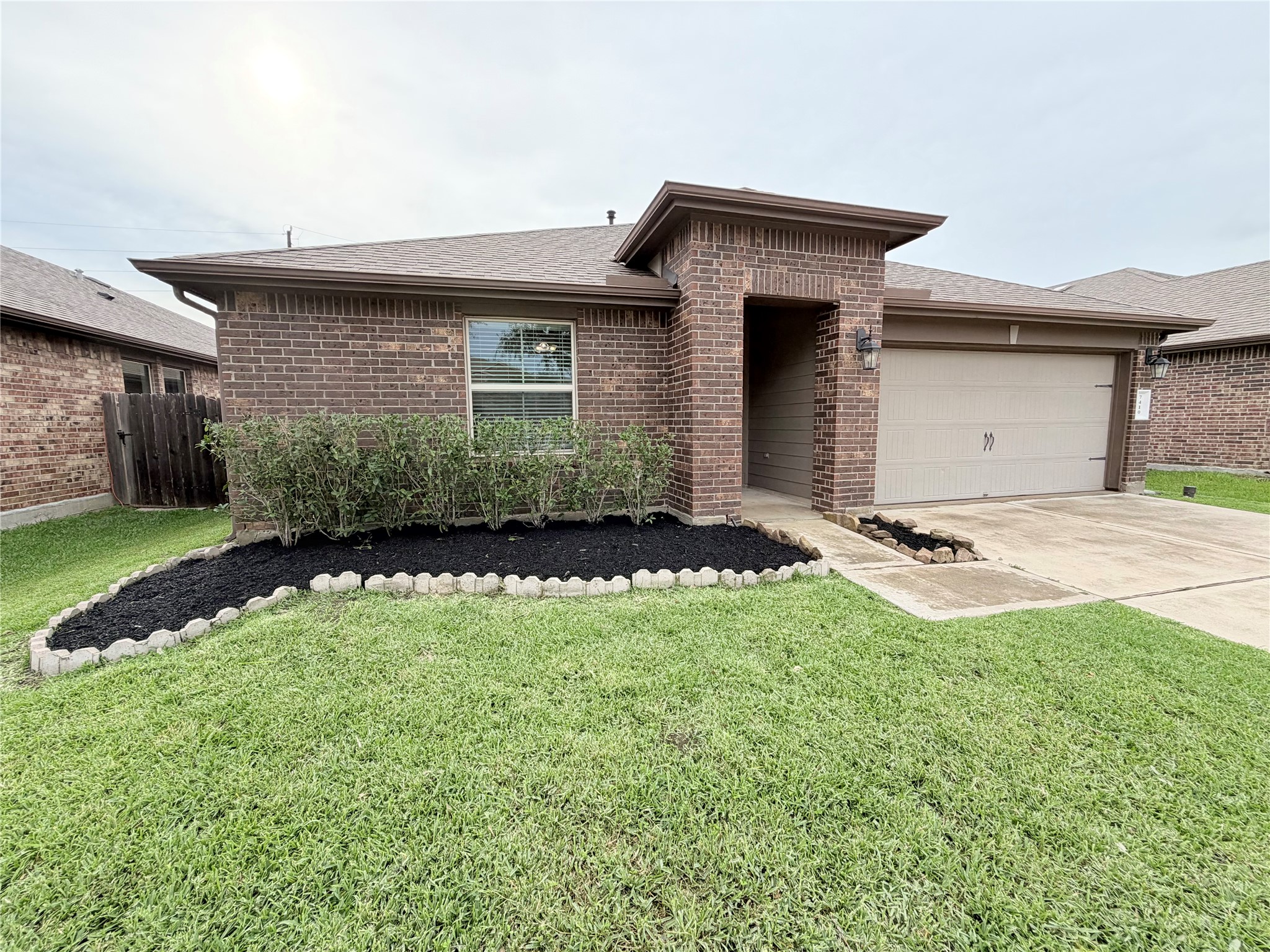 Welcome home! Charming curb appeal with a covered front entry and landscaped flower beds. Welcome home! Charming curb appeal with a covered front entry and landscaped flower beds.