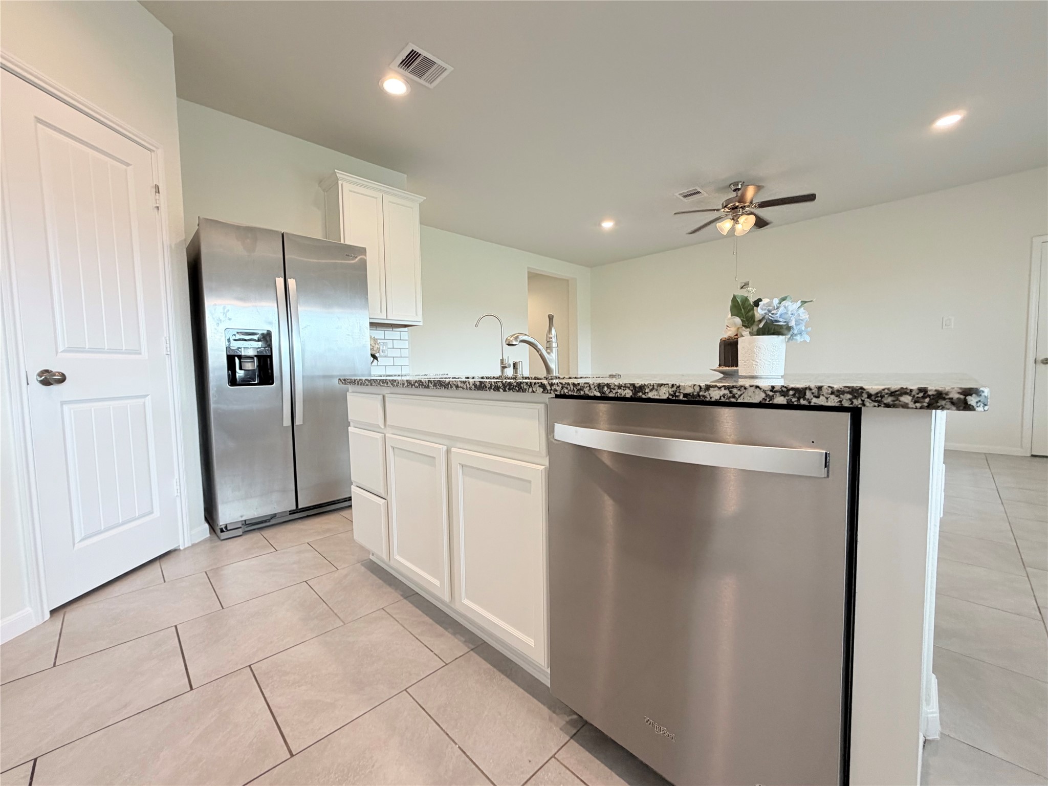 Stainless steel refrigerator shown in photos is not included in the sale. Stainless steel refrigerator shown in photos is not included in the sale.