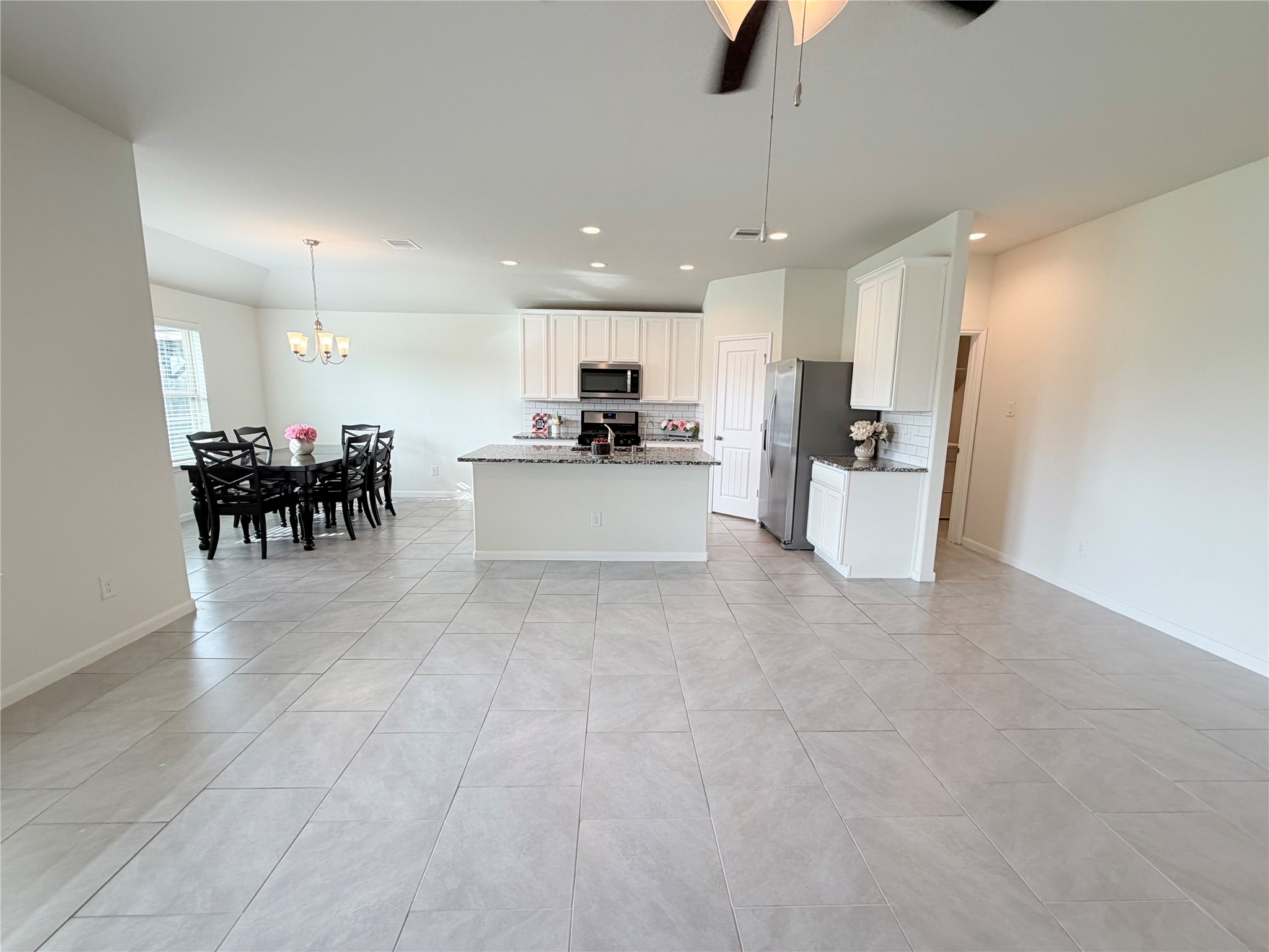 newly painted interior and updated white cabinetry give this home a light, bright, move in ready appeal.