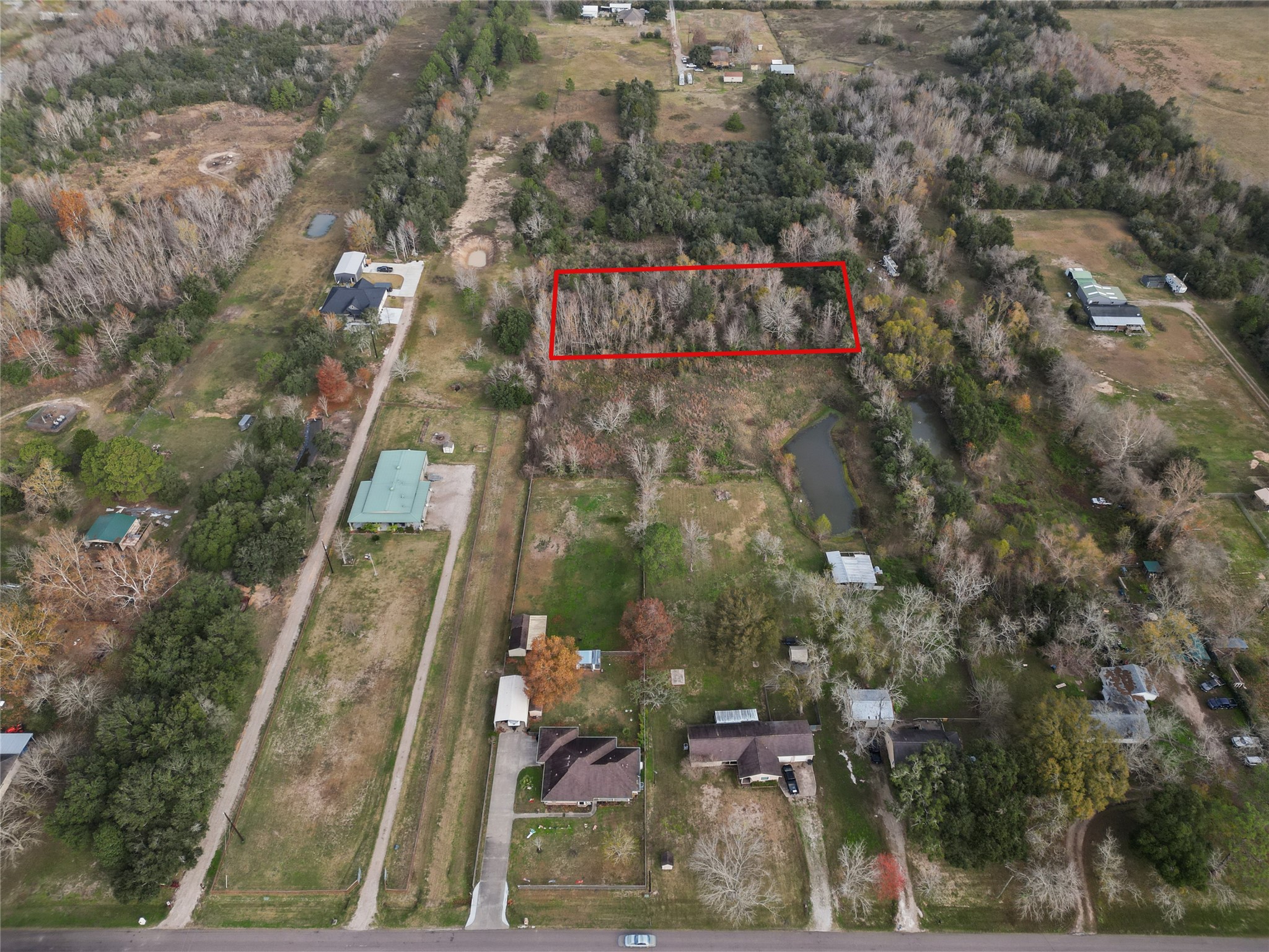 Sits back behind houses and 2 open acres giving you the privacy you want Sits back behind houses and 2 open acres giving you the privacy you want