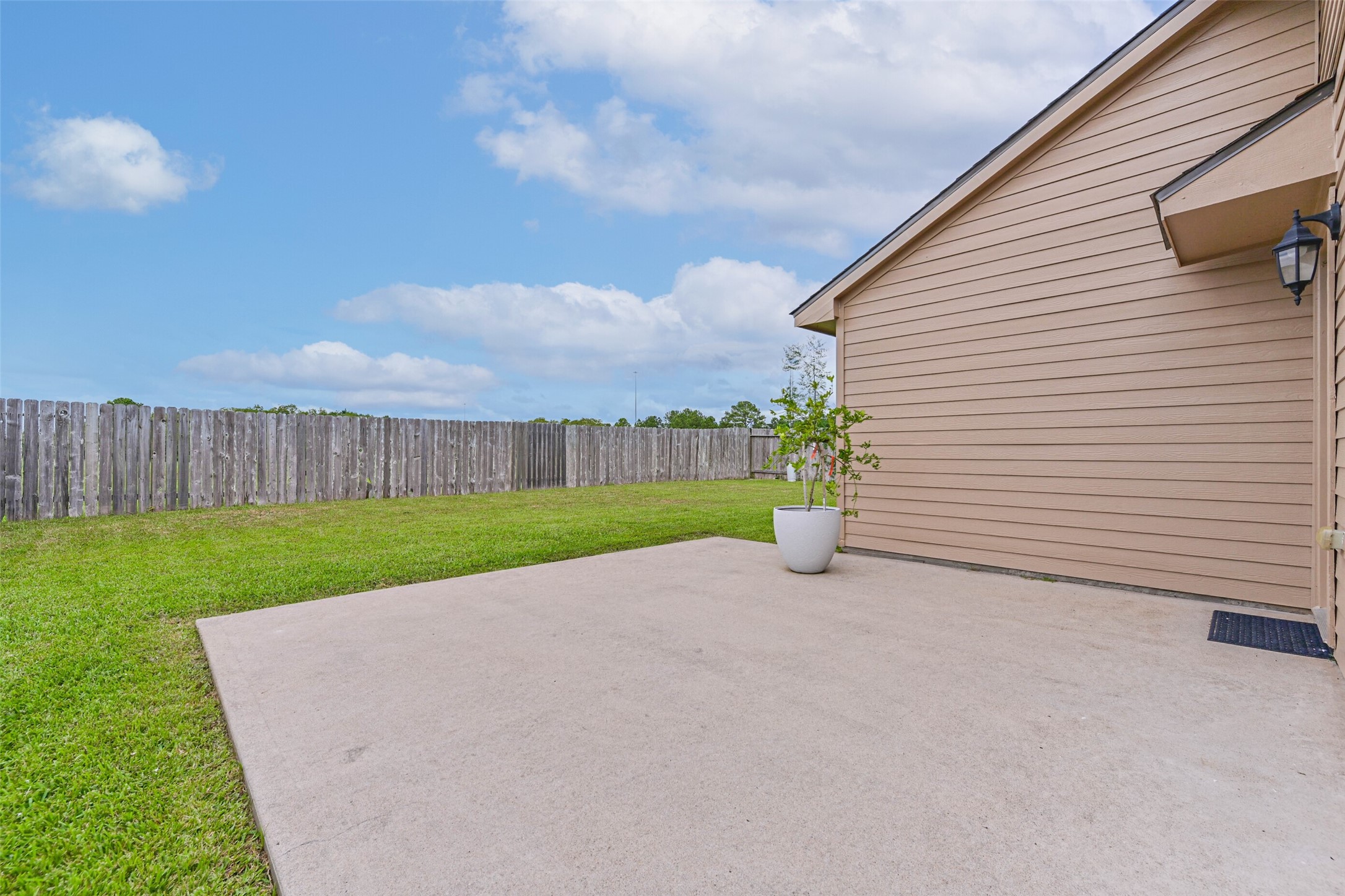 A view of the oversized concrete patio