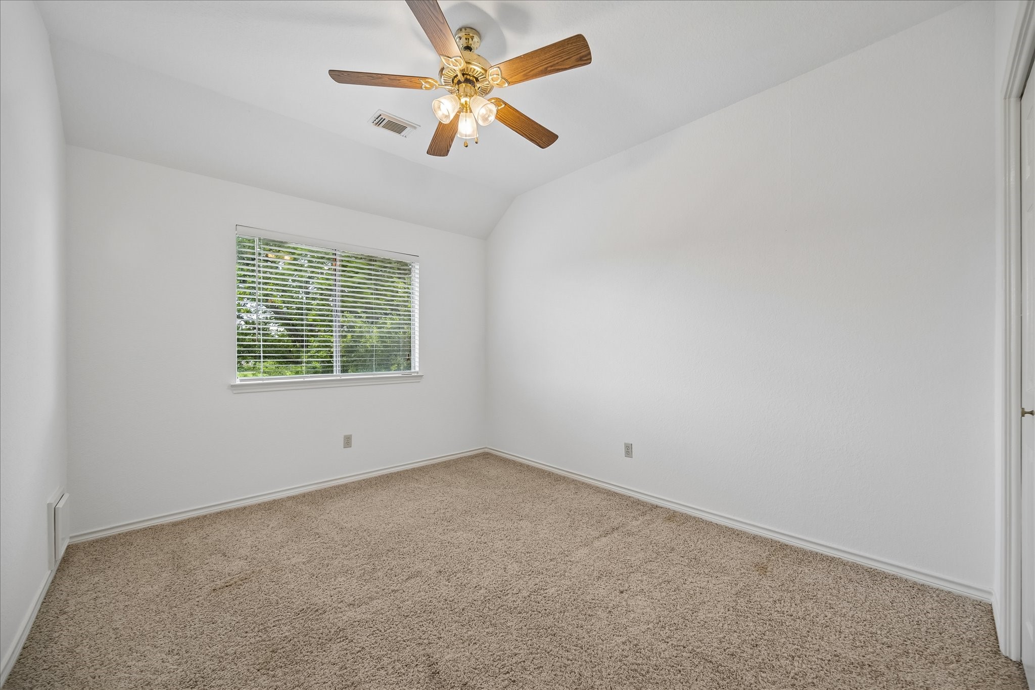 And this is the 2nd of the 3 secondary bedrooms.  Looks out to the back, as does the 3rd secondary bedroom - which photo is forthcoming.