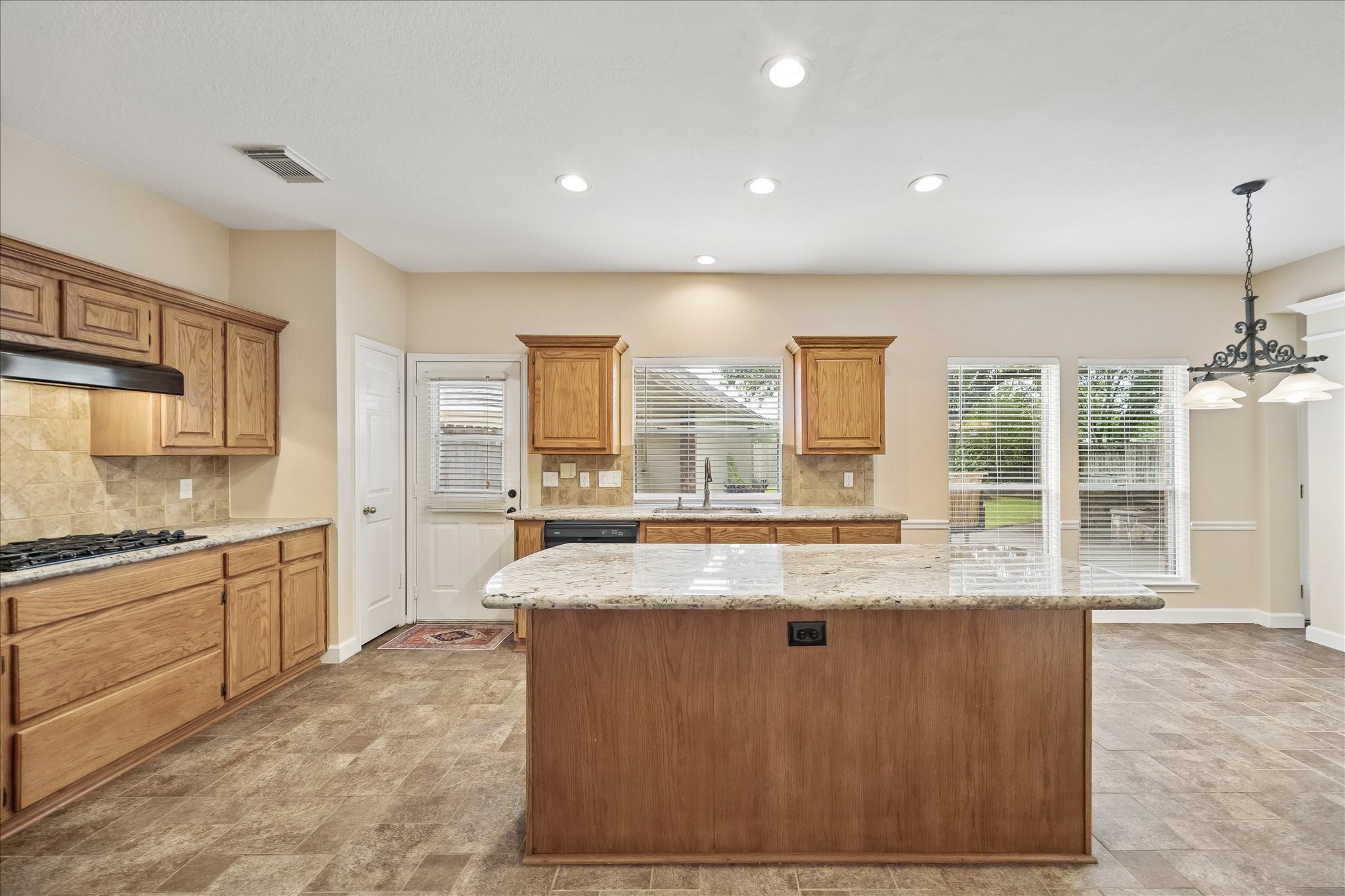 This is the view walking into the kitchen from the dining room.