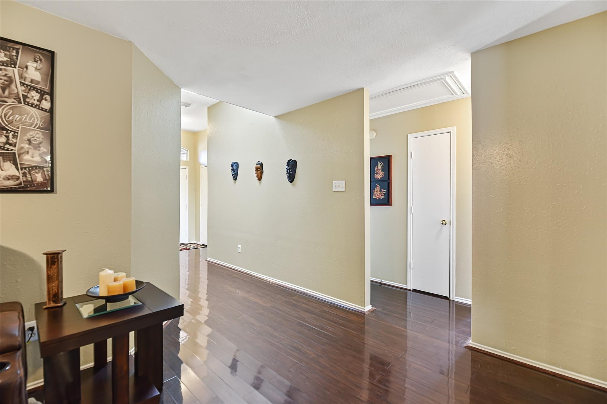 View of the hallway before the recent neutral paint