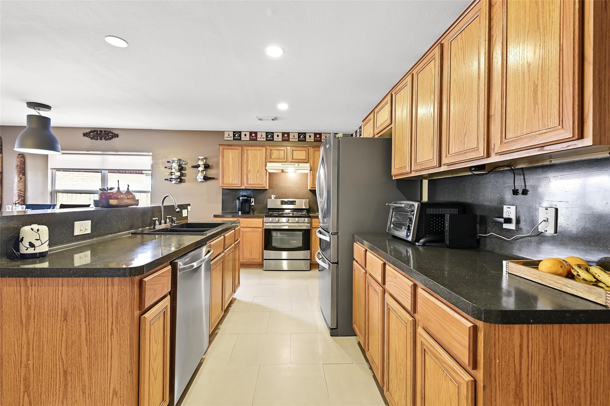 View of the kitchen before the recent neutral paint