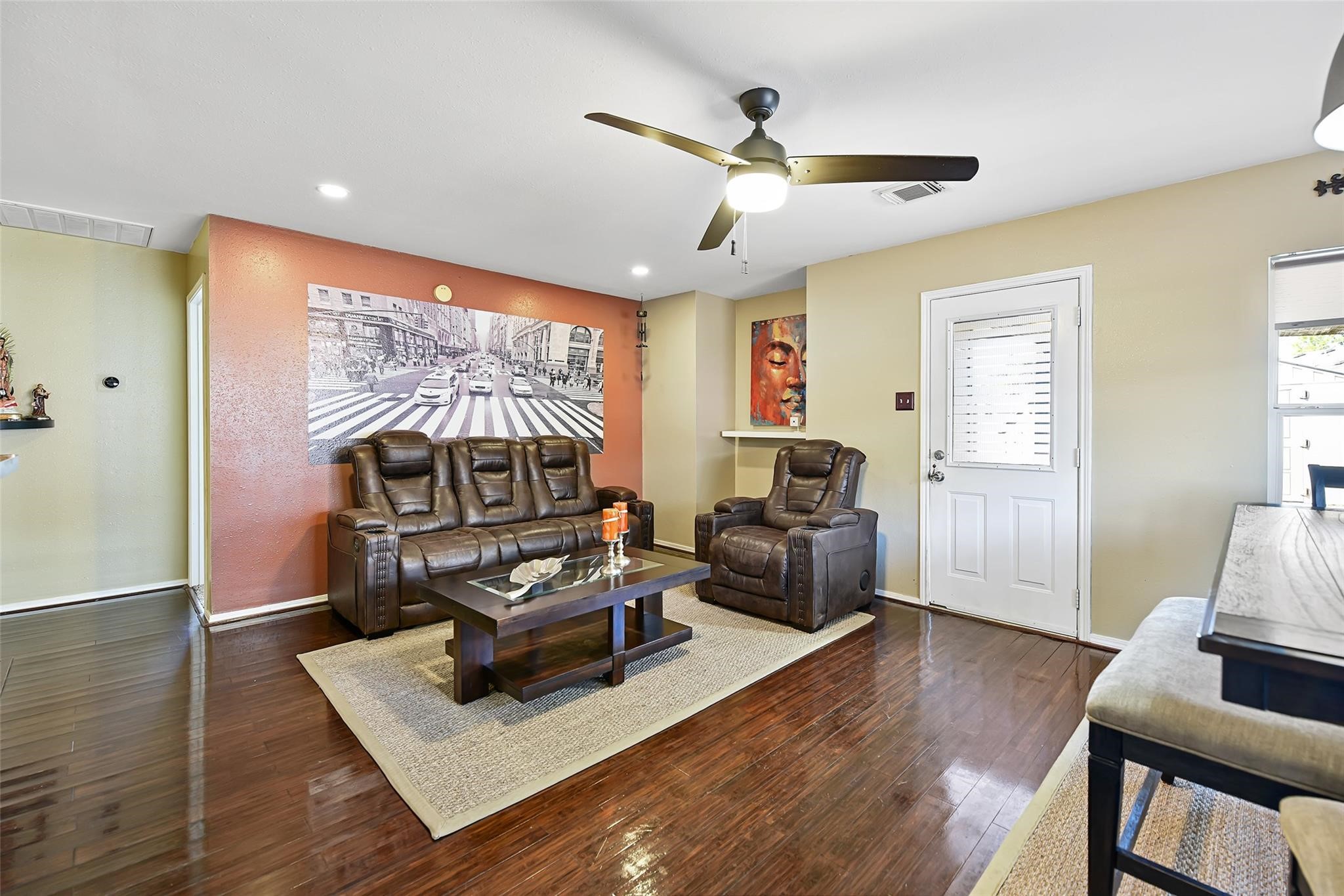 View of the living room before the recent neutral paint
