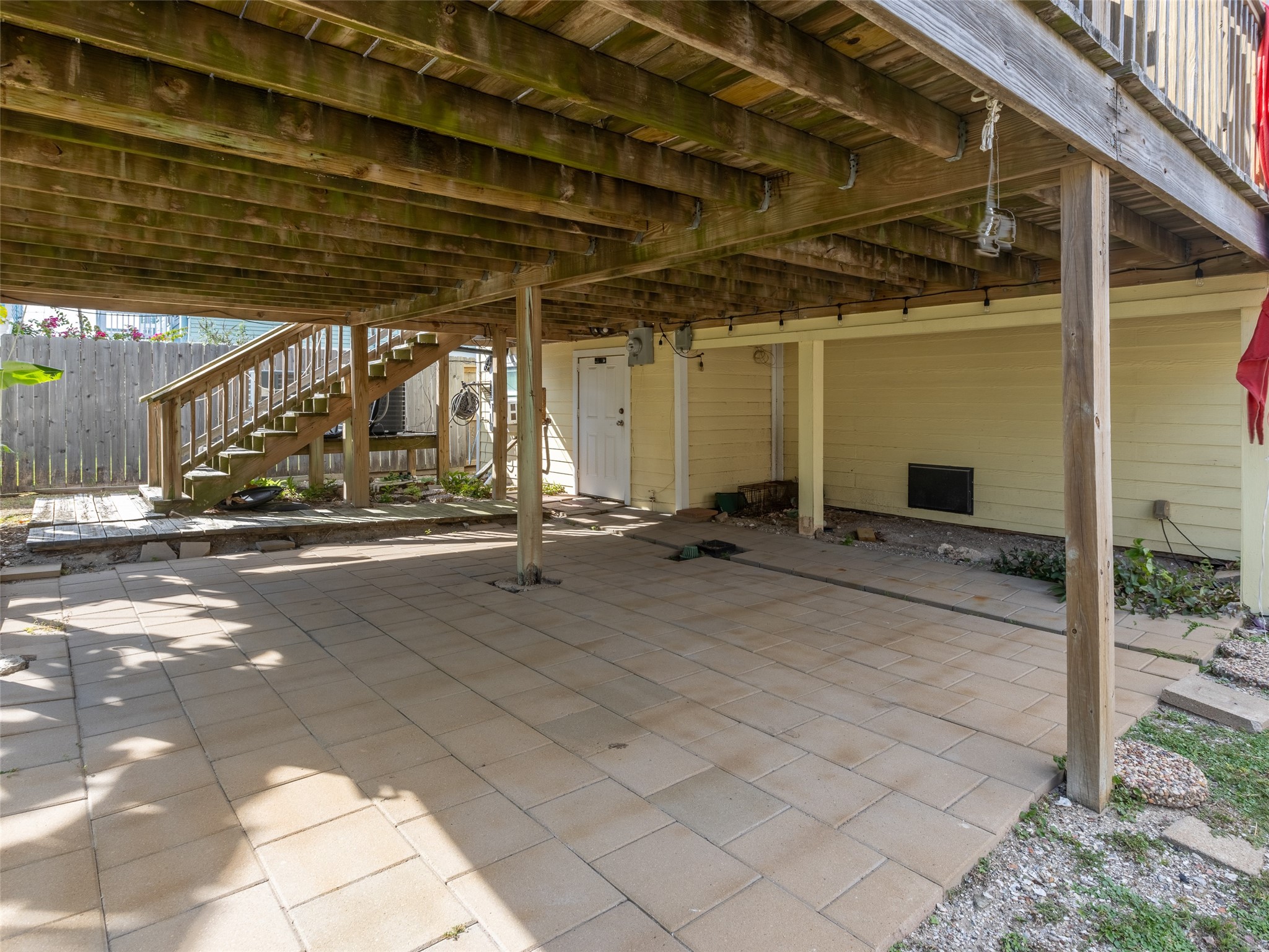 Under the deck in back patio