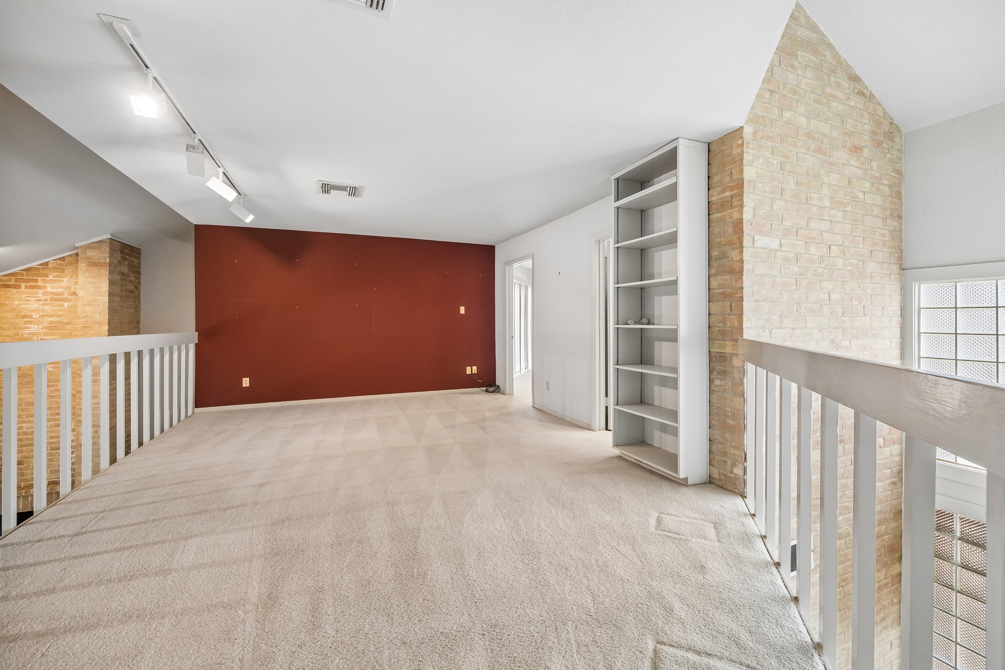 On the second floor is a family room loft area and two additional bedrooms.