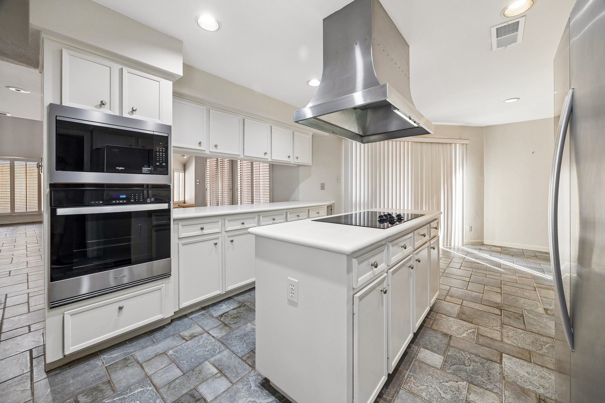 The kitchen features updated stainless appliances and lots of great counter space.