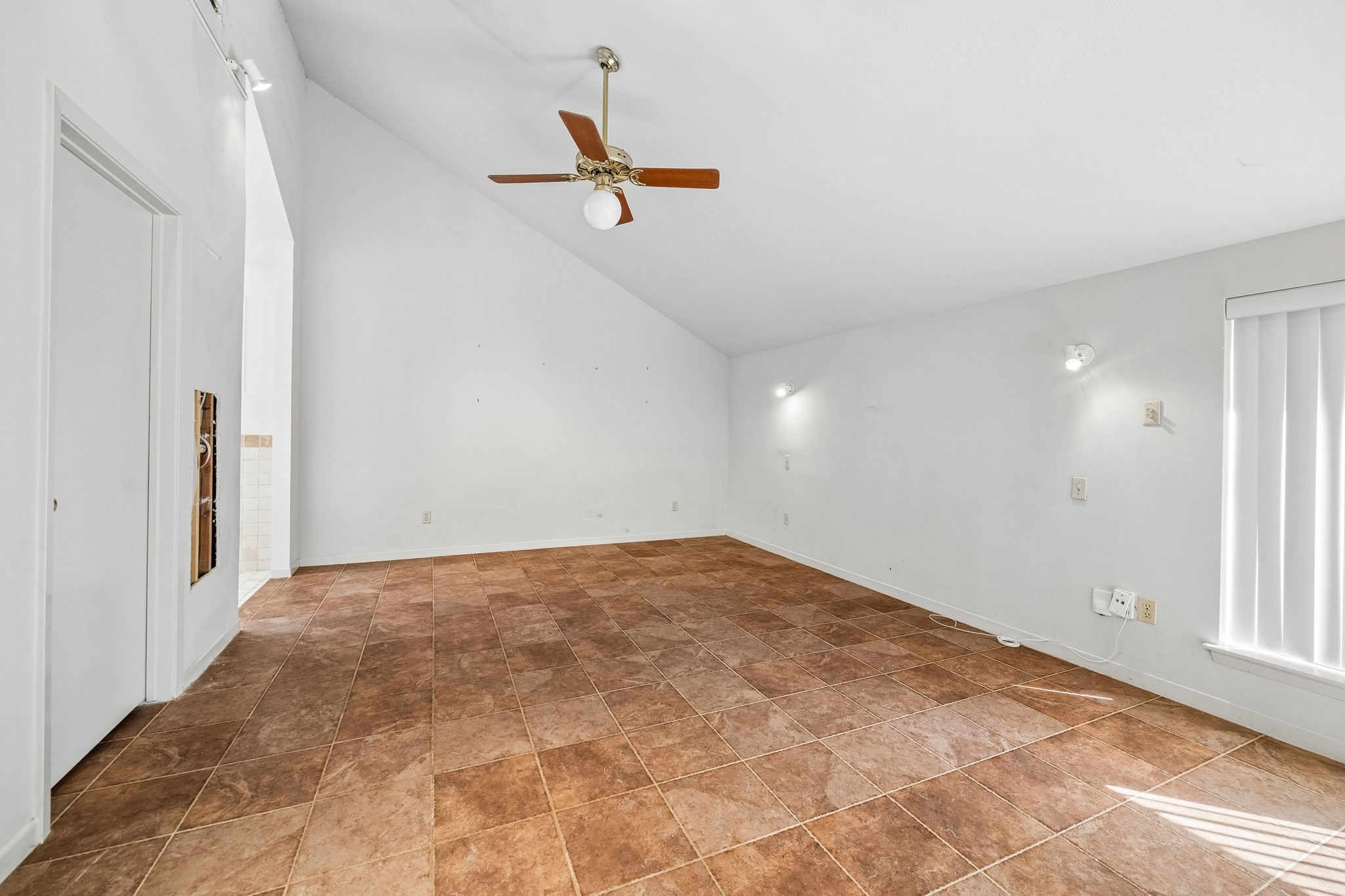 The primary bedroom features tall ceilings, large closet and huge en-suite bath.
