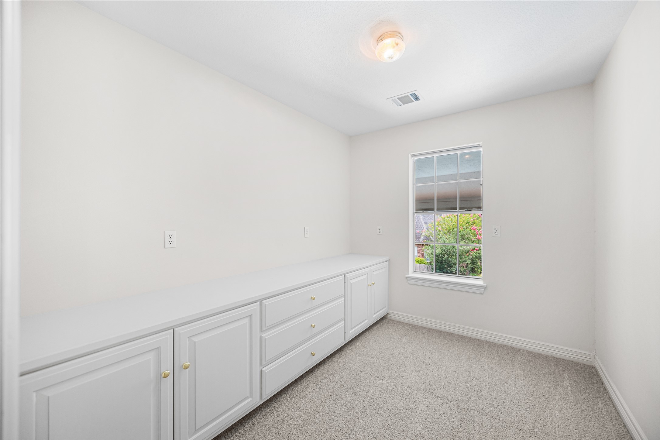 Flexible bonus/craft room perfect for hobbies, homeschooling, or a fitness space.