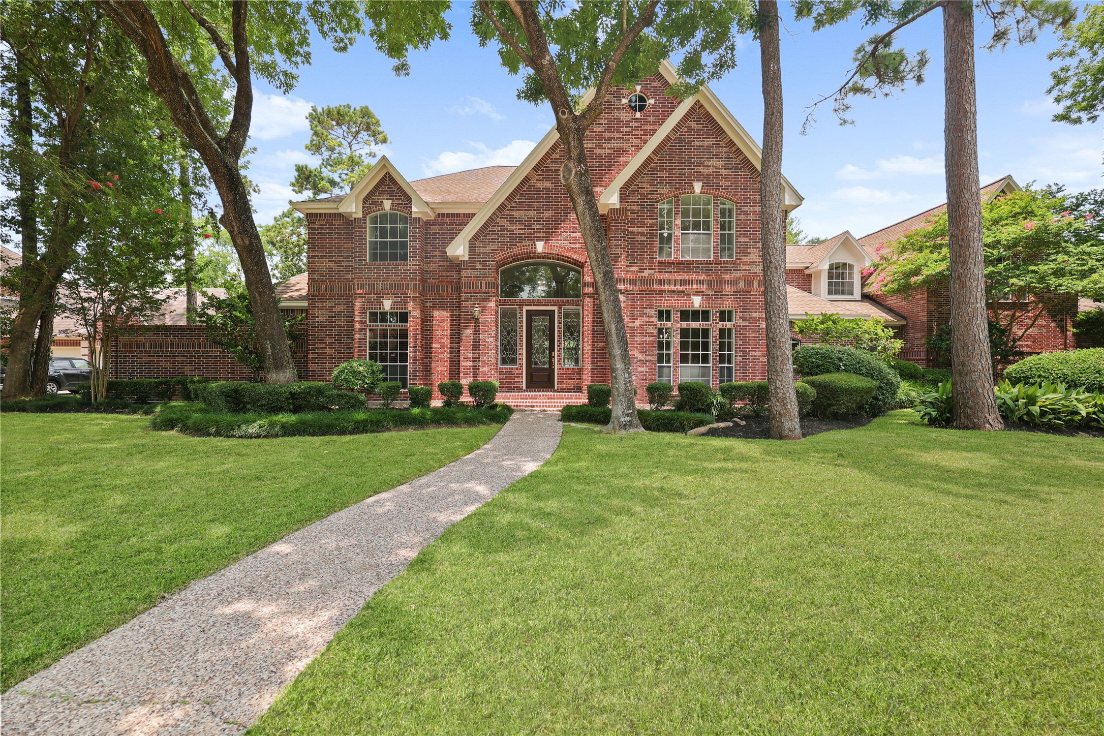 Stately all-brick exterior with timeless architecture and exceptional curb appeal. Stately all-brick exterior with timeless architecture and exceptional curb appeal.