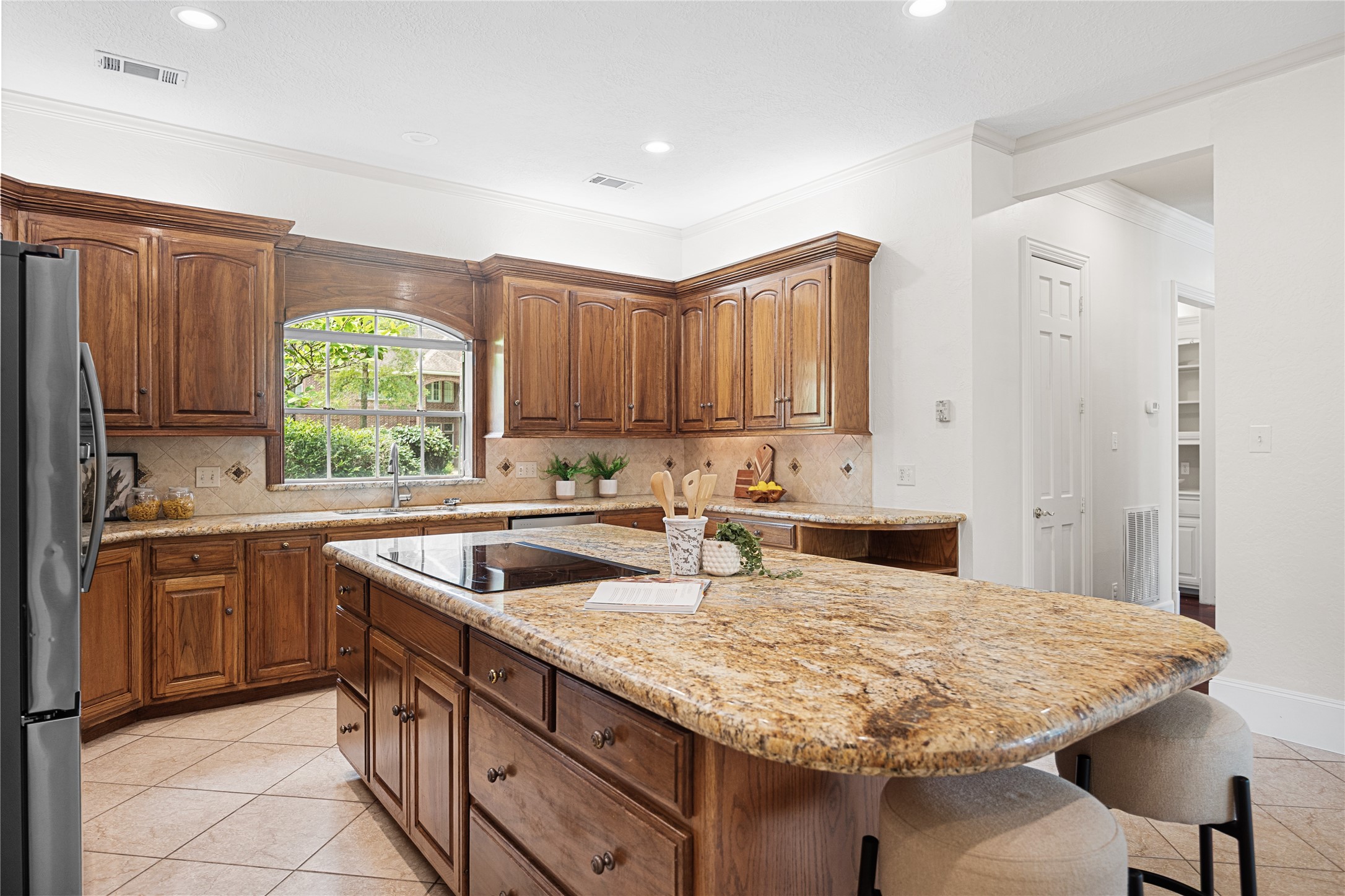 Large center island serves as the heart of the home.