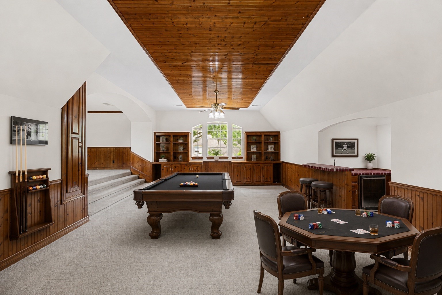 The possibilities are endless in this game room! Virtually staged for visual purposes.