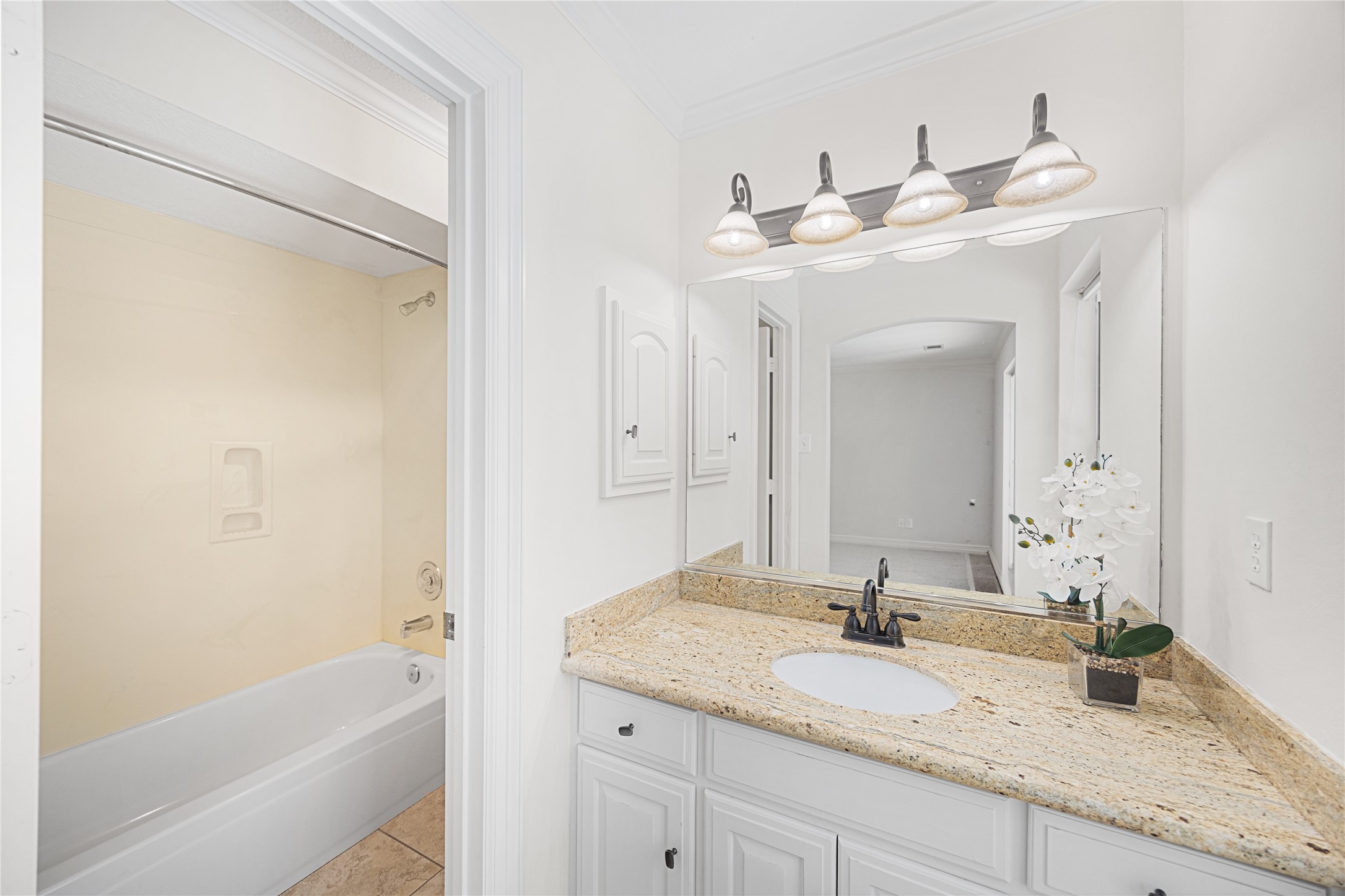 En-suite bath providing comfort and privacy.