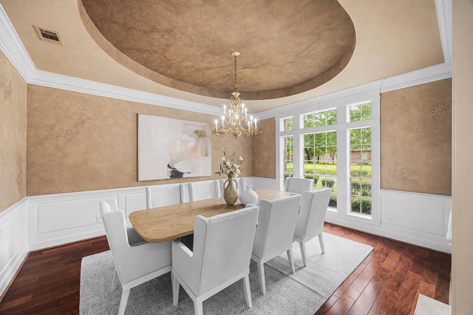 Formal dining room featuring custom finishes and abundant natural light. Formal dining room featuring custom finishes and abundant natural light.