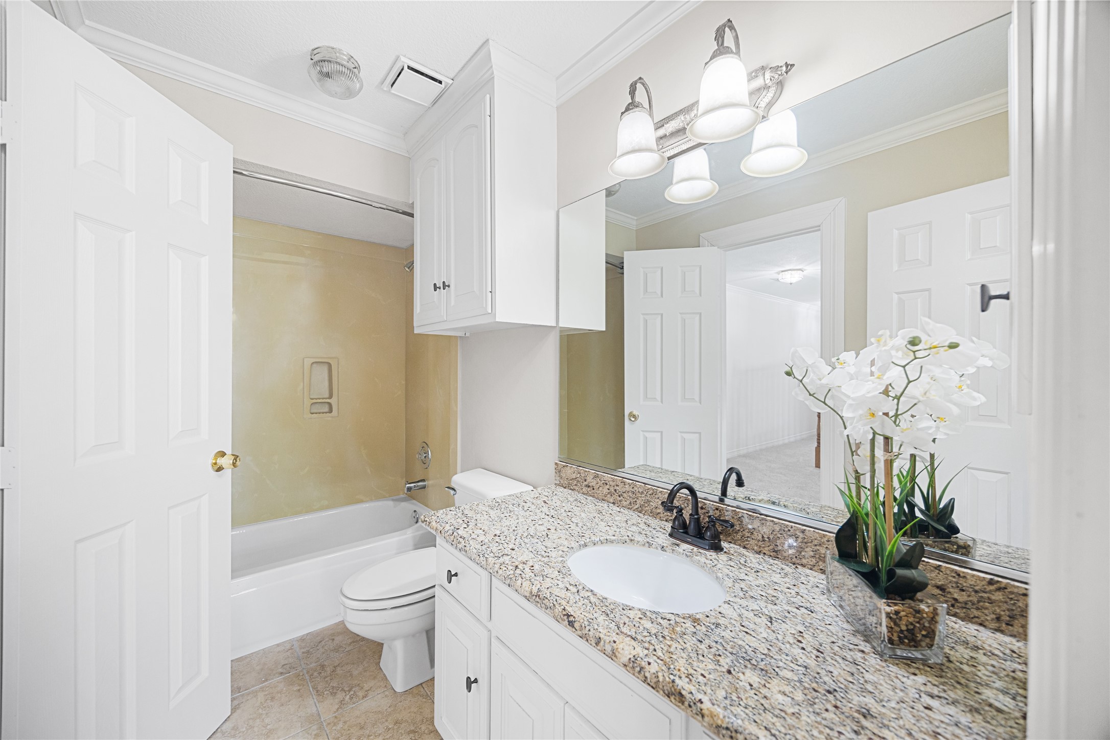 En-suite bath providing comfort and privacy.