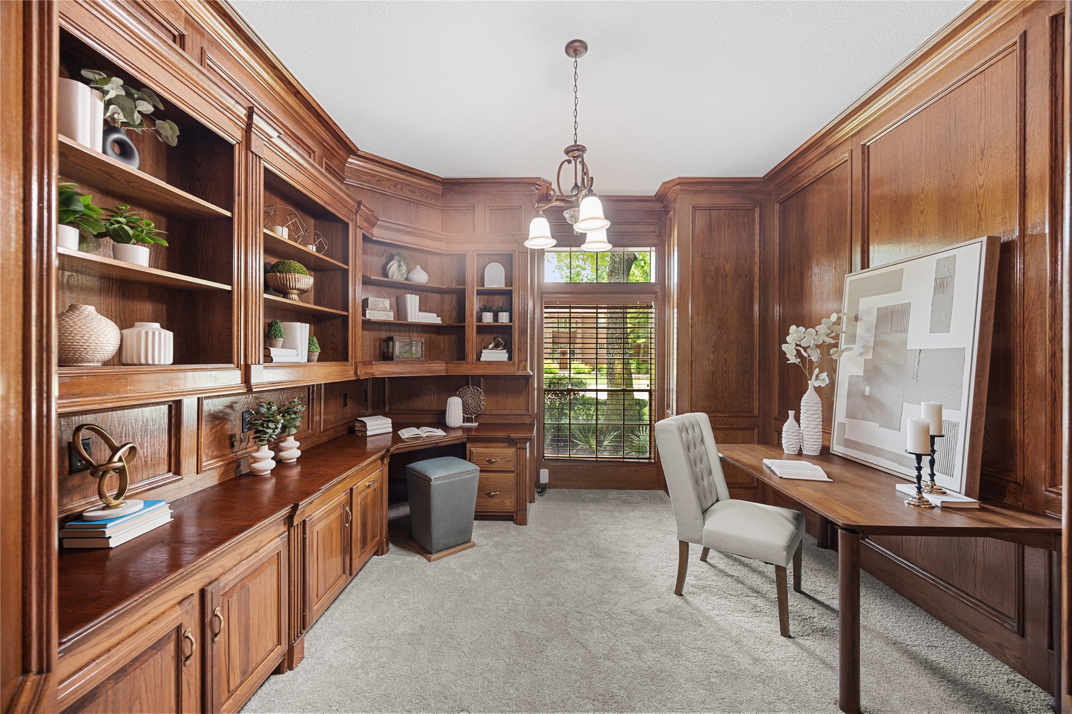 Dedicated executive office with rich custom built-in cabinetry.