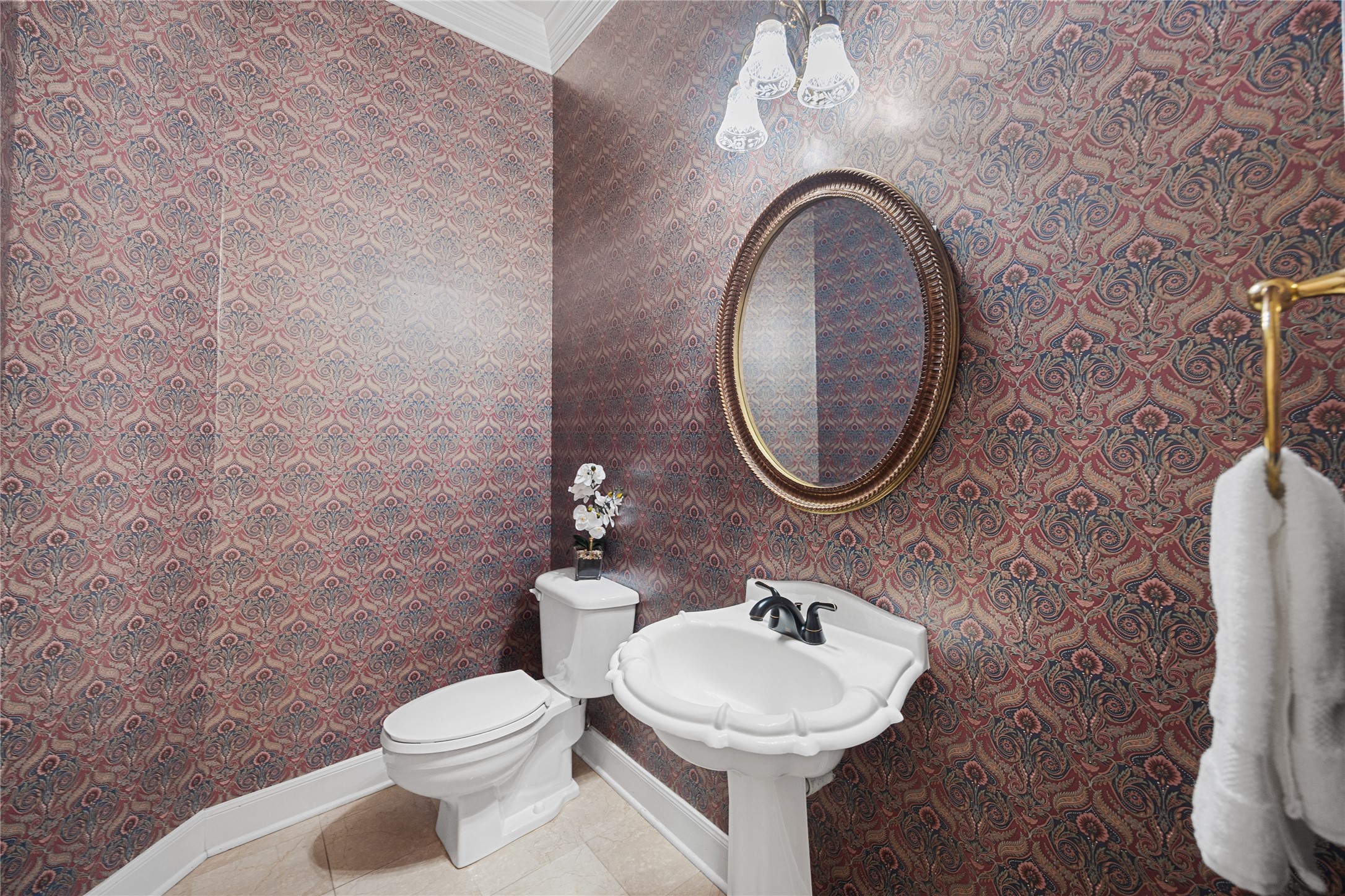 Elegant powder bath with designer finishes.