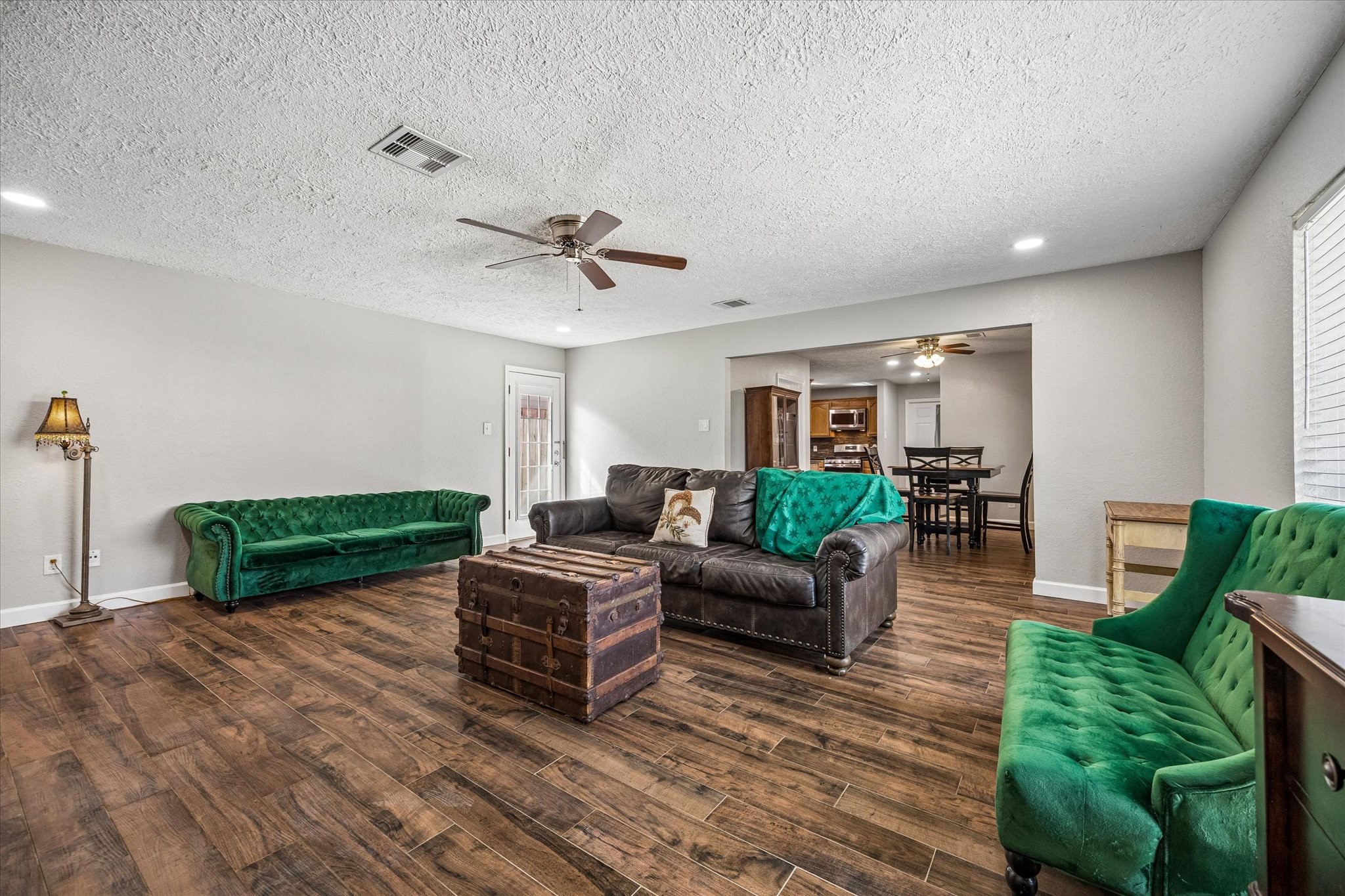 The inviting layout creates a seamless flow between living spaces, making it ideal for entertaining guests.