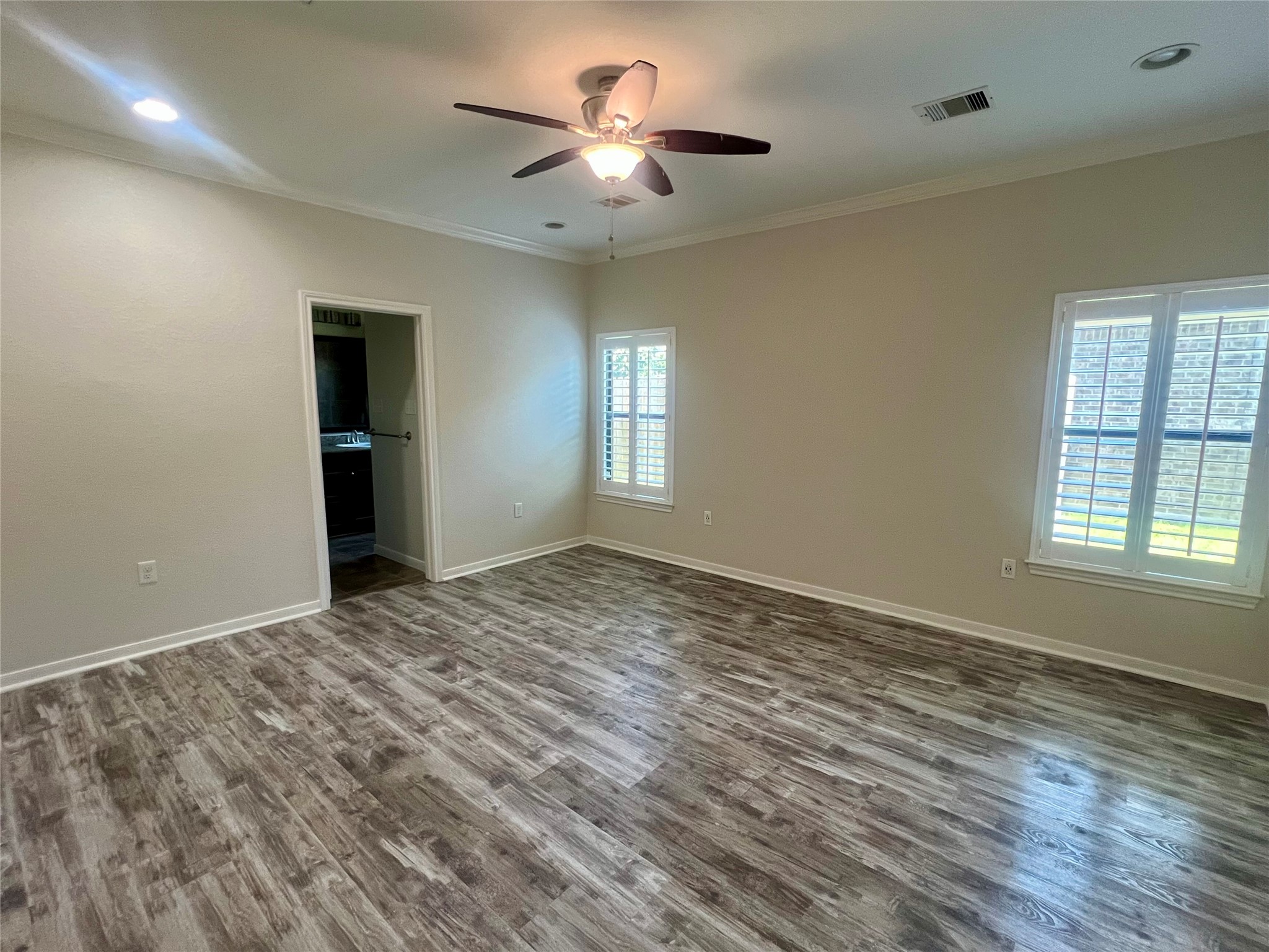 Primary bedroom with plenty of natural light. Primary bedroom with plenty of natural light.